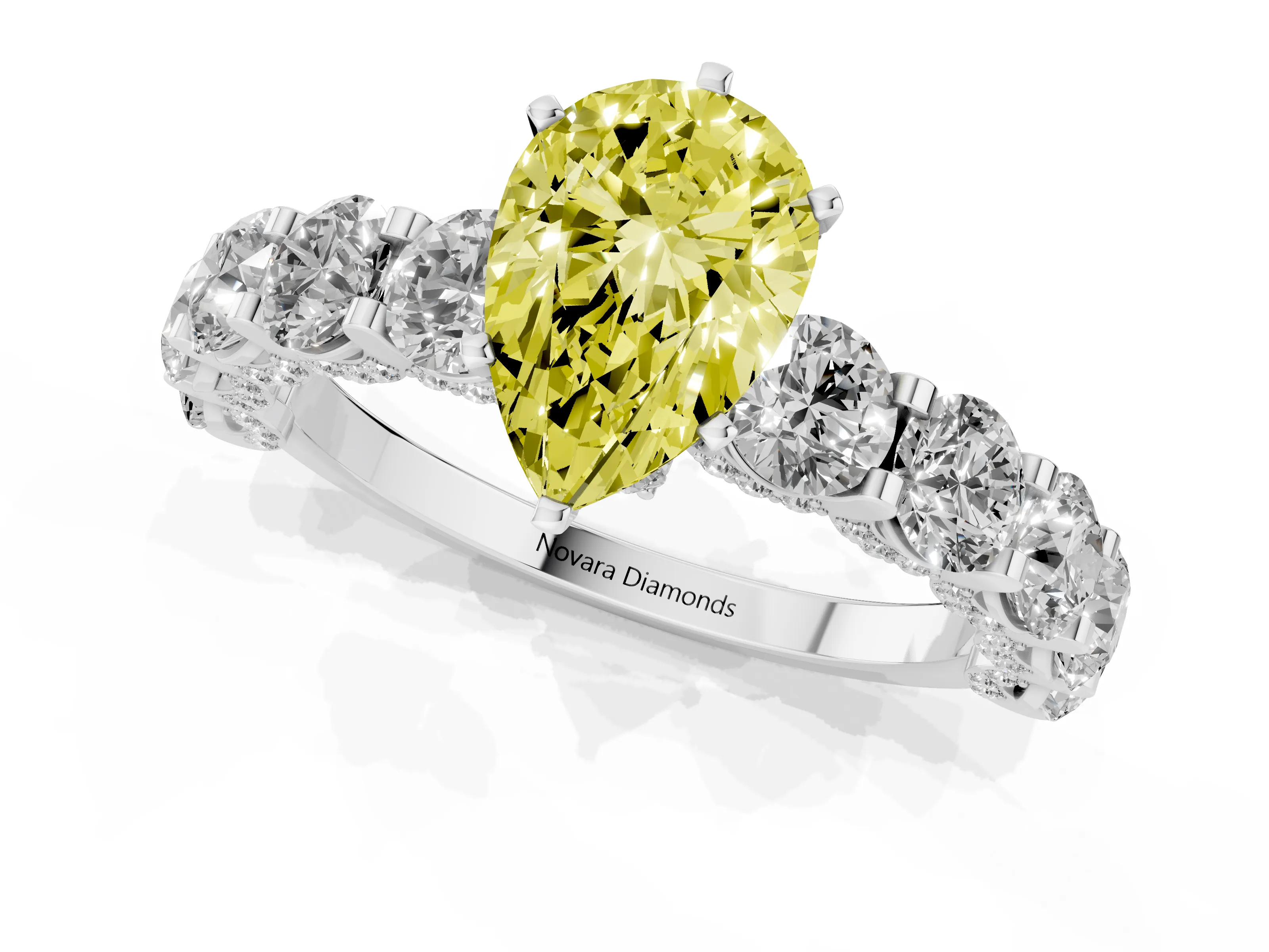 Fancy Yellow Pear Cut Diamond Side Stone Ring Set in Platinum with Alternating Round and Oval Side Stones