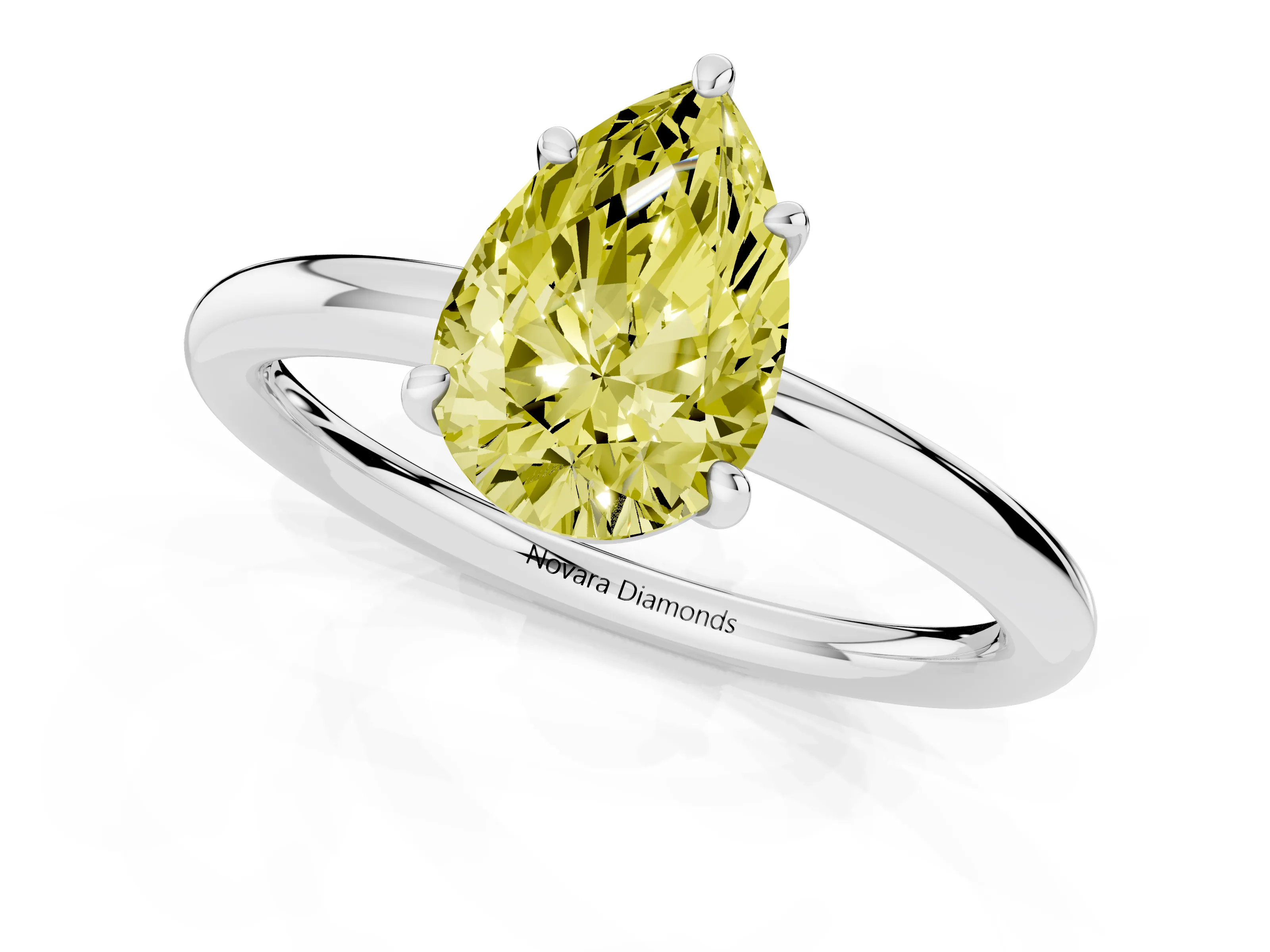 Fancy Yellow Pear Cut Diamond Solitaire Ring Set in White gold with Prong Setting on a Polished Plain Band