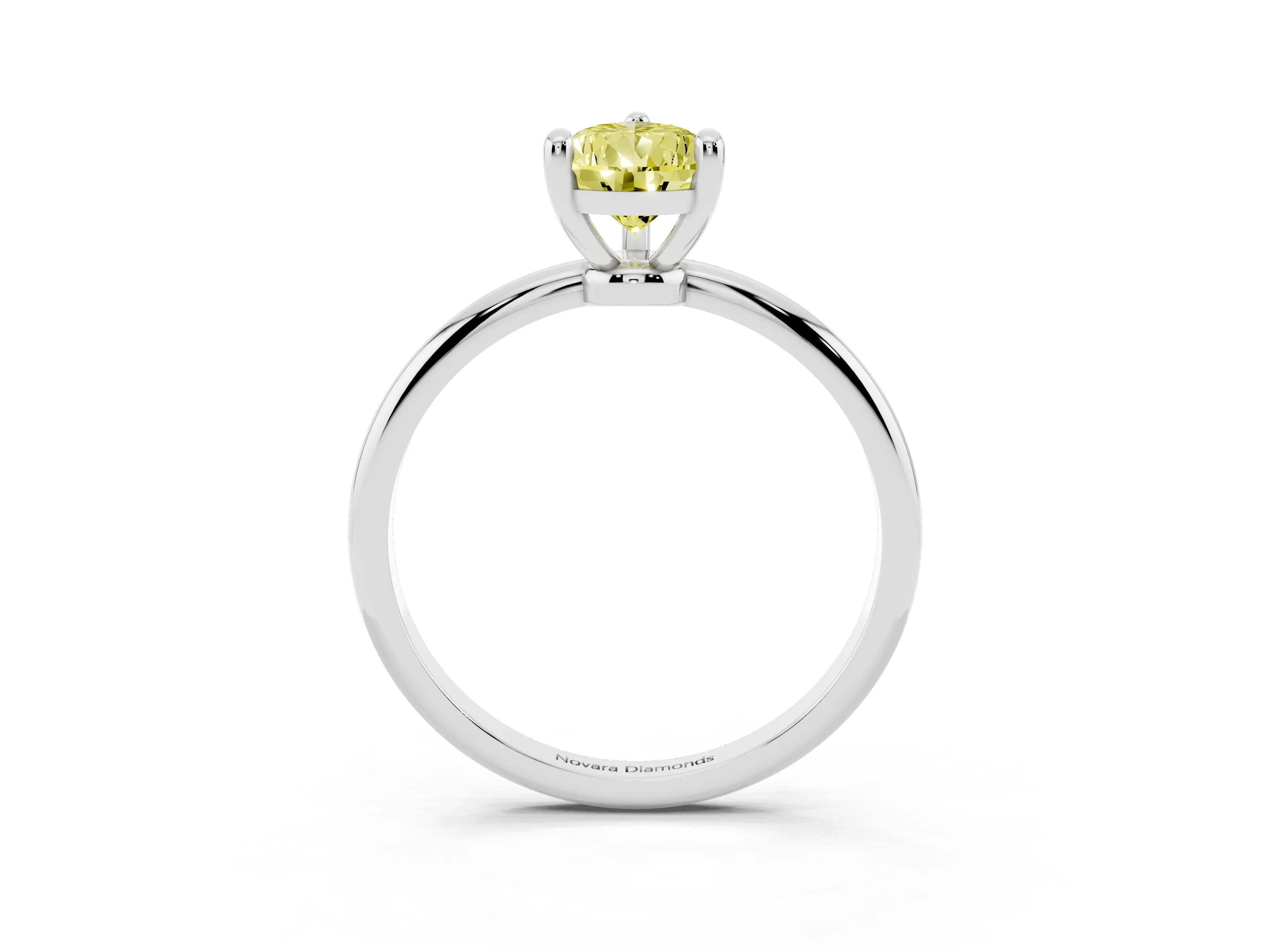 Fancy Yellow Pear Cut Diamond Solitaire Ring Set in Silver with Secure Prong Setting on a Classic Band