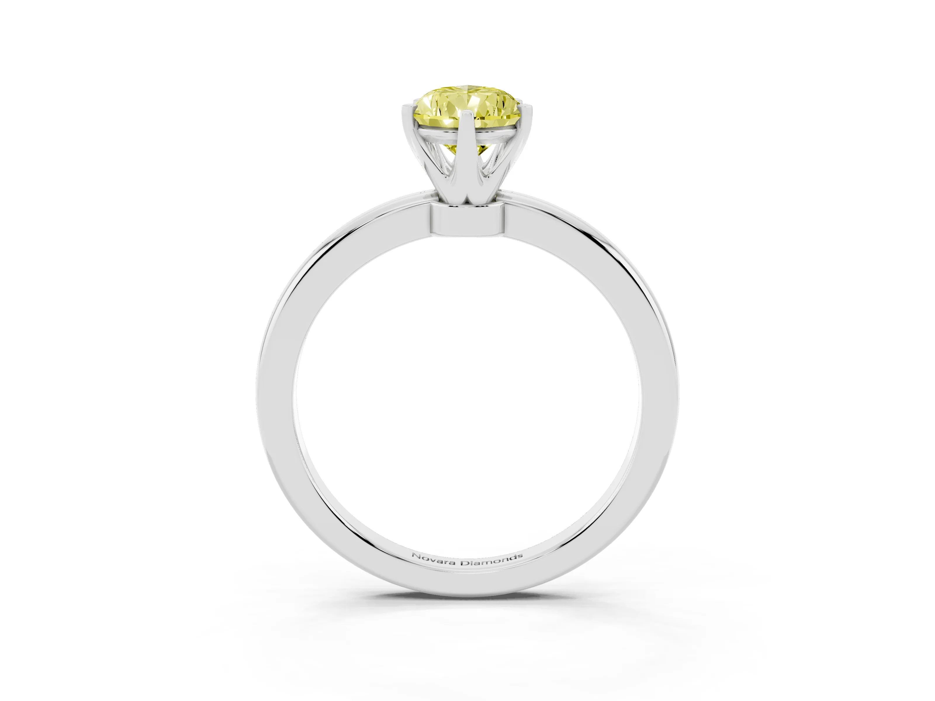 Fancy Yellow Pear Cut Diamond Solitaire Ring Set in Silver with Raised Prong Setting on a Classic Band
