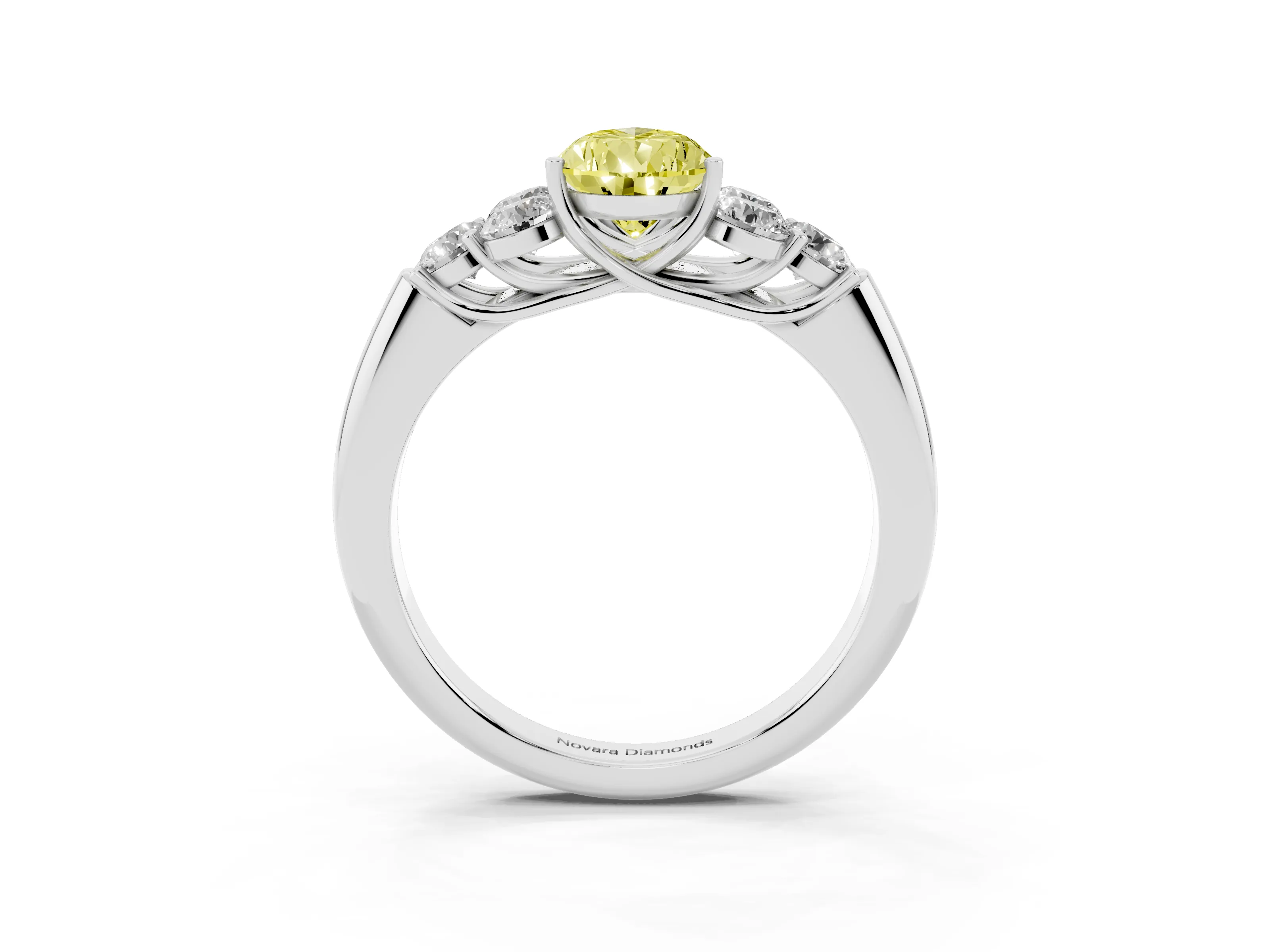 Fancy Yellow Pear Cut Diamond Cluster Ring Set in Platinum with Round Accent Stones and Prong Setting on a Plain Band