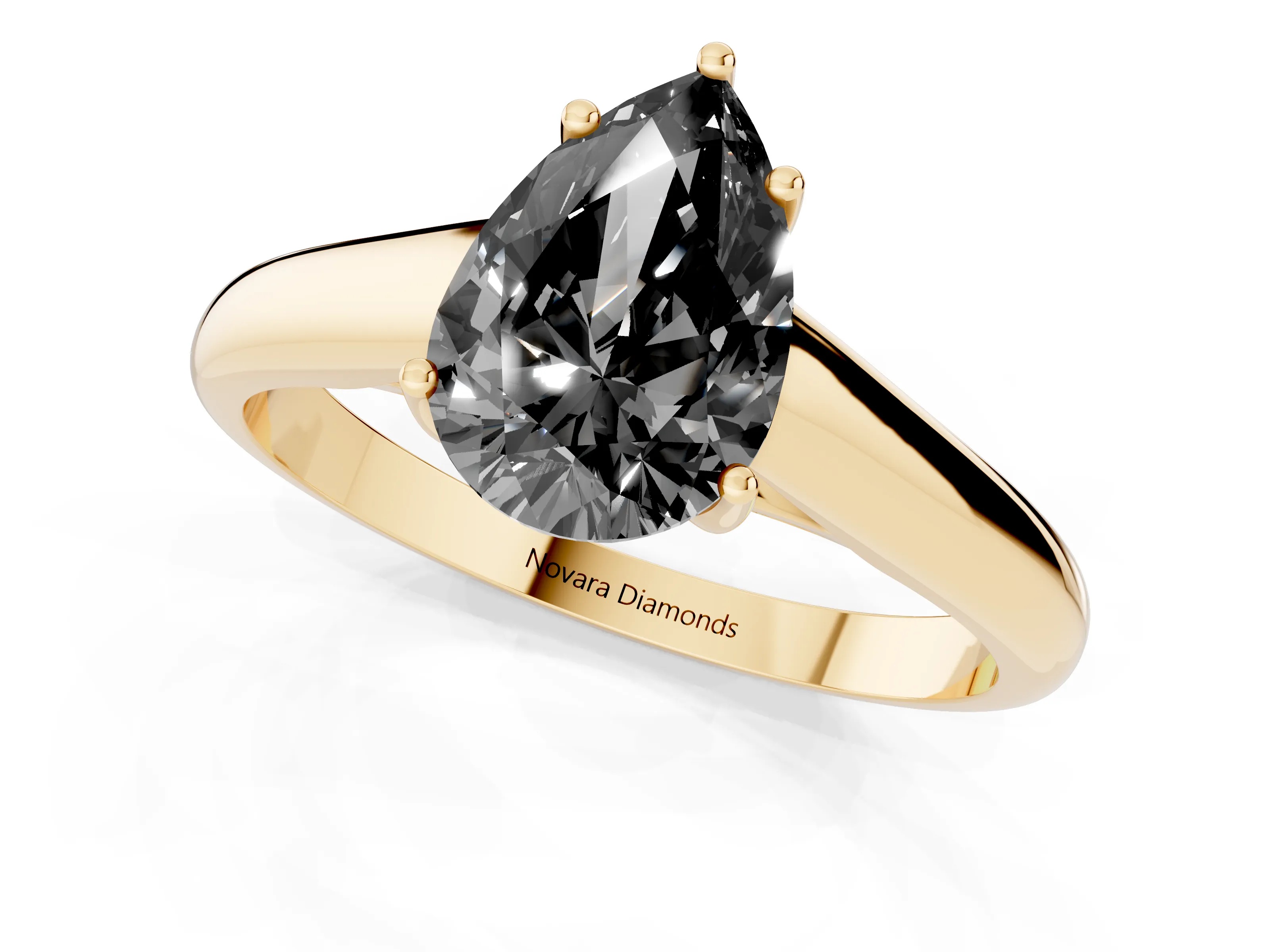 Fancy Black Pear Cut Diamond Solitaire Engagement Ring Set in Yellow gold with Subtly Tapered Band and Prong Setting