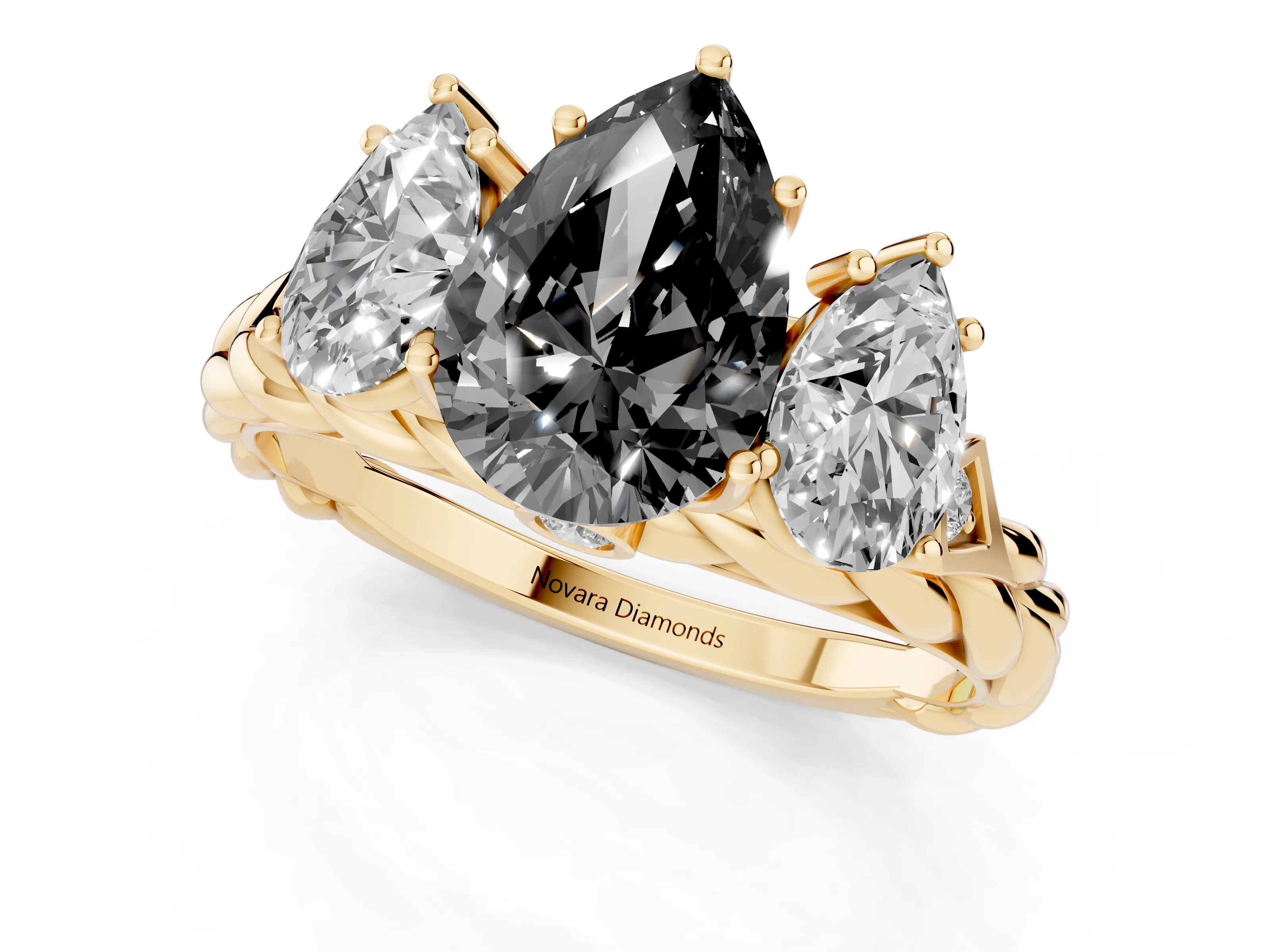 Fancy Black Pear Cut Diamond Three-Stone Ring Set in Yellow gold with Braided Band