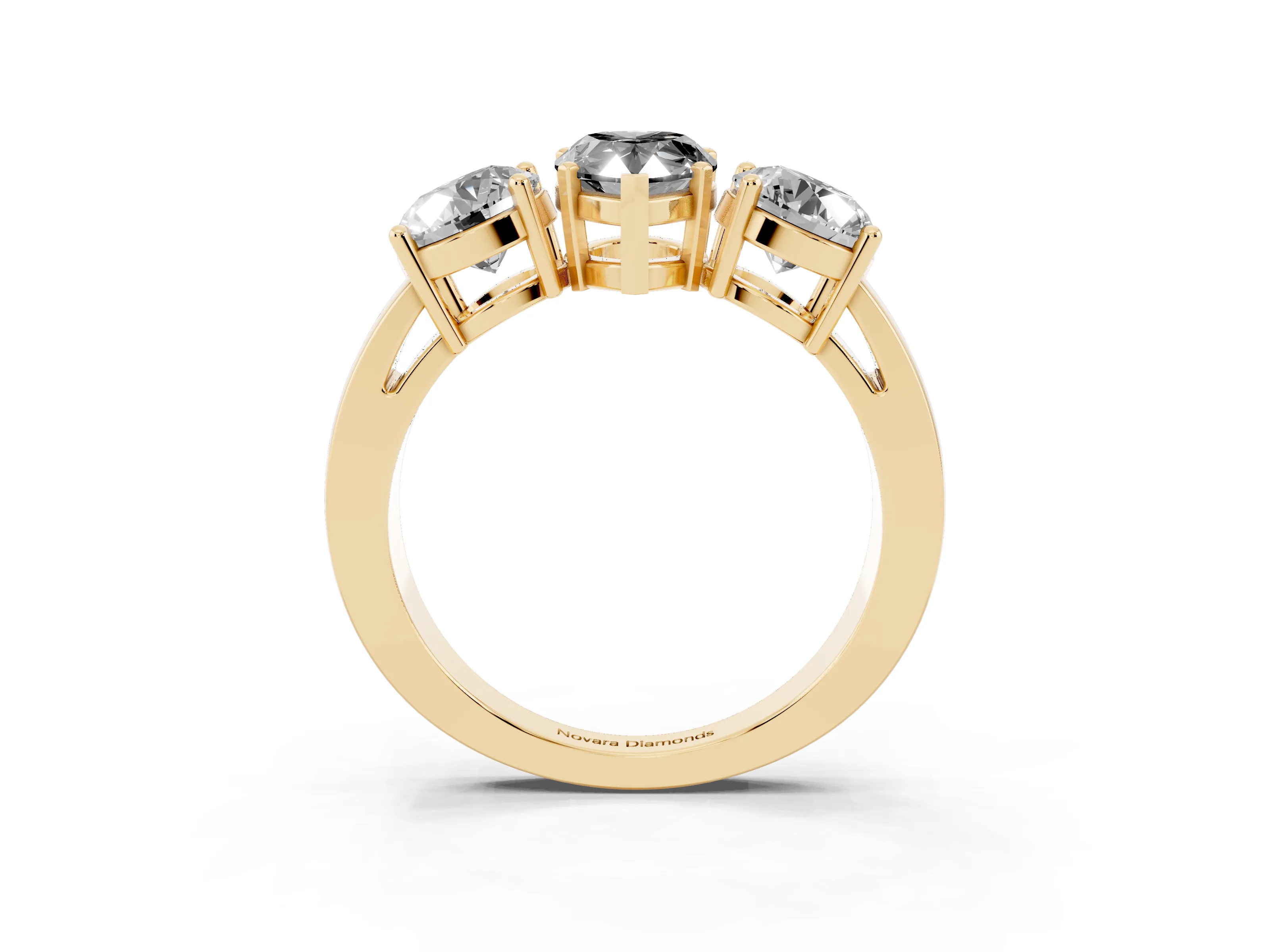 Fancy Black Pear Cut Diamond Three-Stone Ring Set in Yellow gold with Round Side Stones and Classic Band