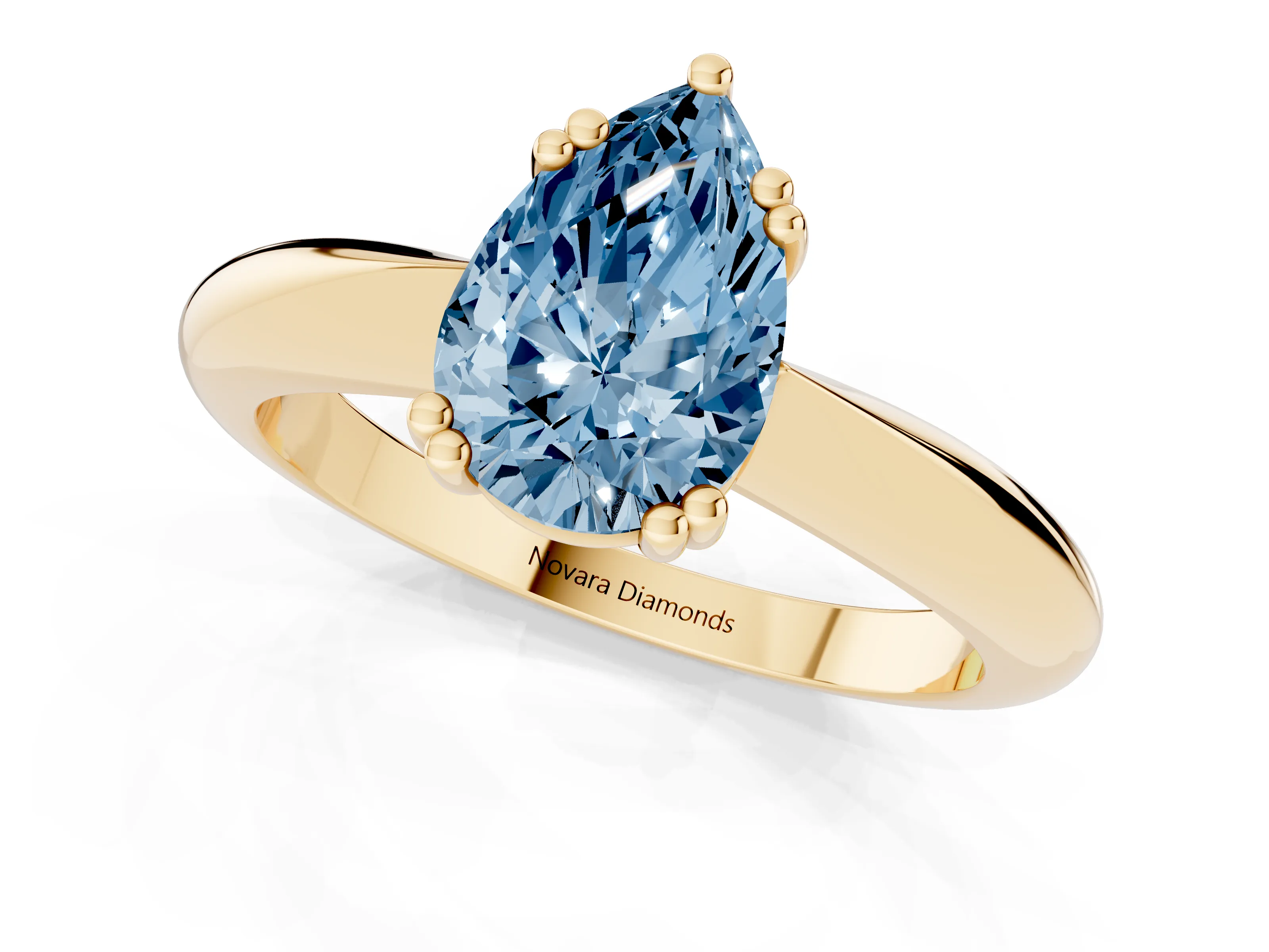 Fancy Blue Pear Cut Diamond Solitaire Engagement Ring Set in Yellow gold with Tapered Band and Prong Setting