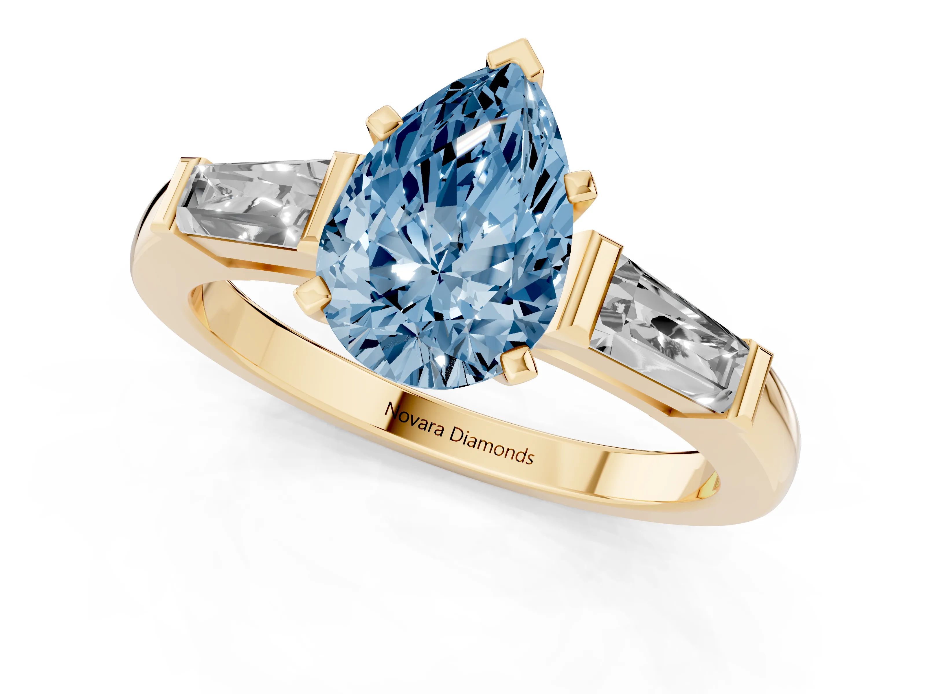 Fancy Blue Pear Cut Diamond Solitaire Ring Set in Yellow gold with Tapered Baguette Side Stones and Prong Setting