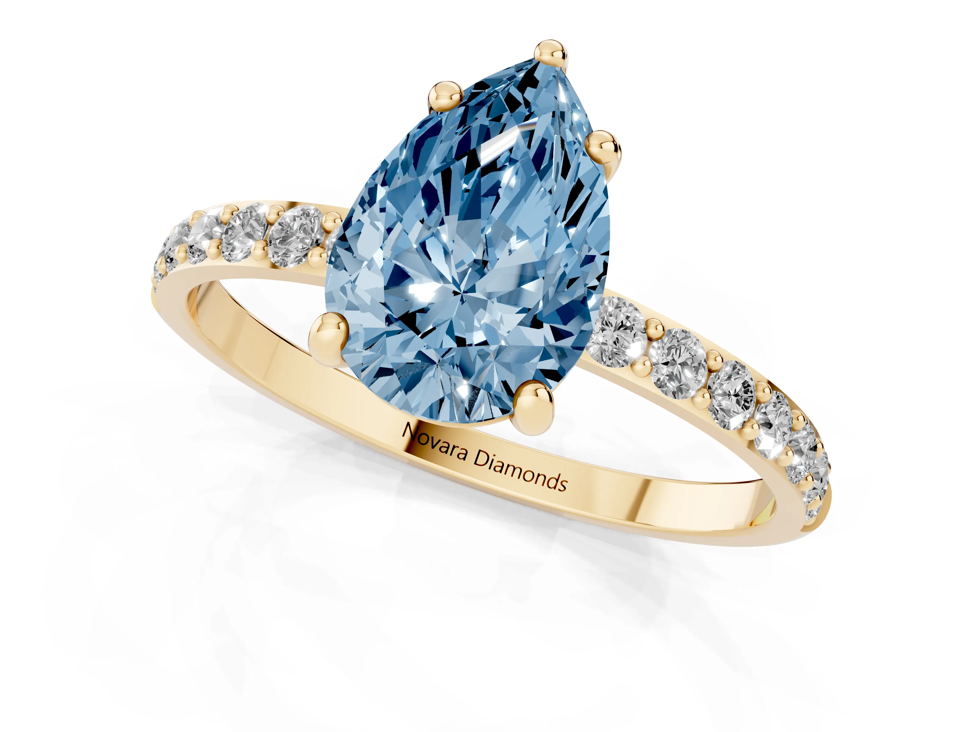 Fancy Blue Pear Cut Diamond Solitaire Ring Set in Yellow gold with Round Pavé Band and Prong Setting