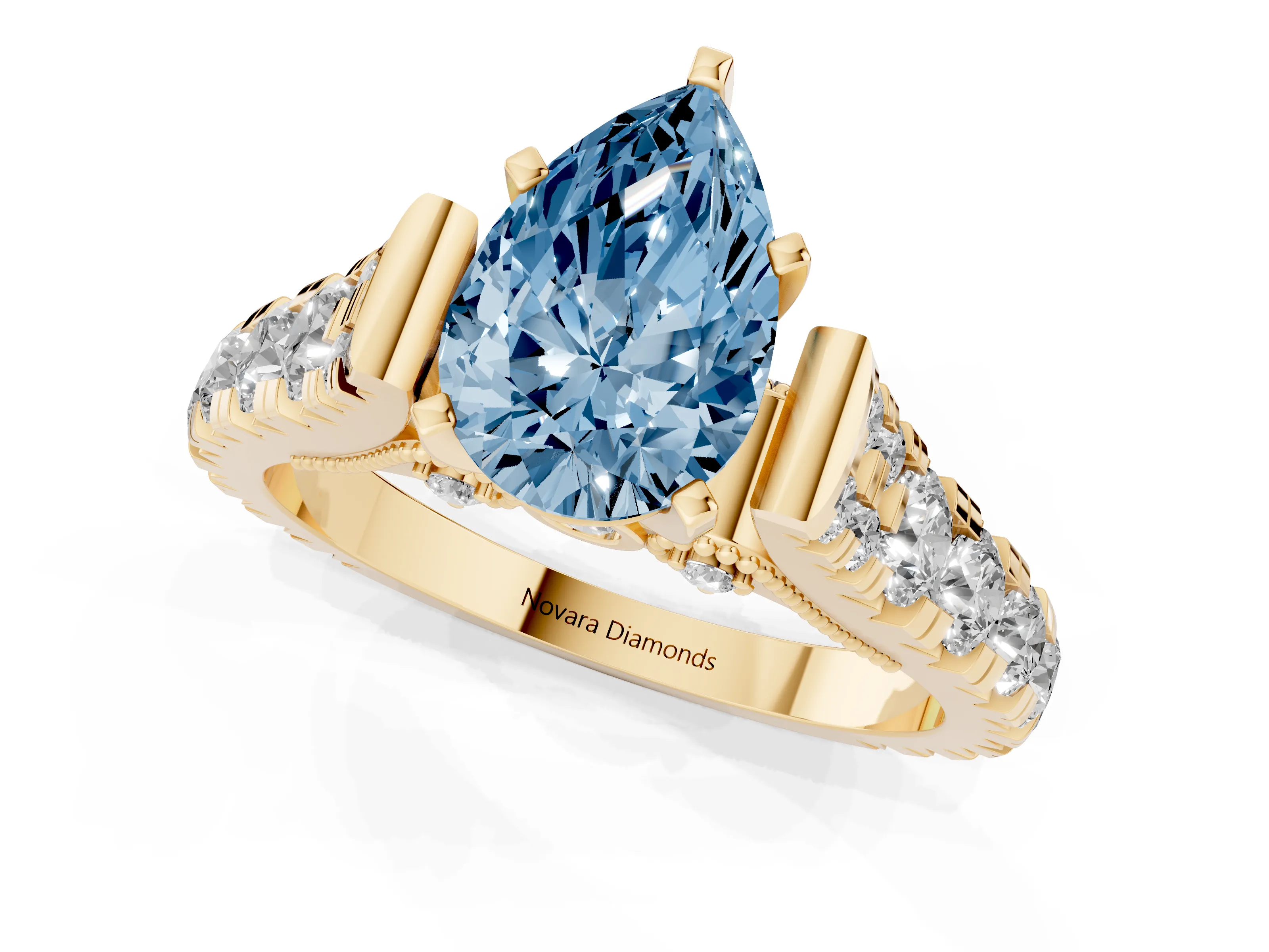 Fancy Blue Pear Cut Diamond Classic Solitaire Ring Set in Yellow gold with Pavé Band and Prong Setting