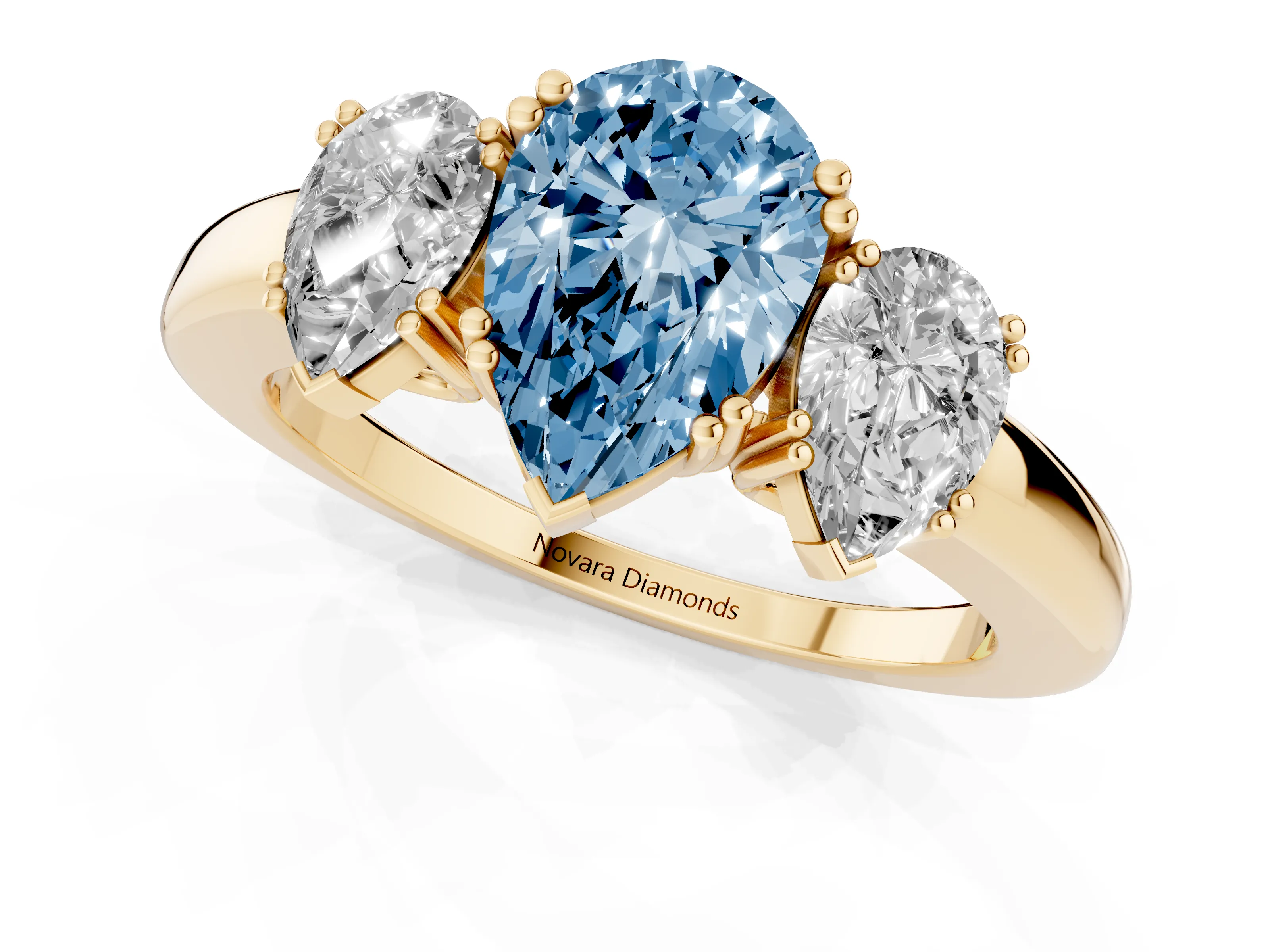 Fancy Blue Pear Cut Diamond Three-Stone Ring Set in Yellow gold with Polished Channel-Set Band