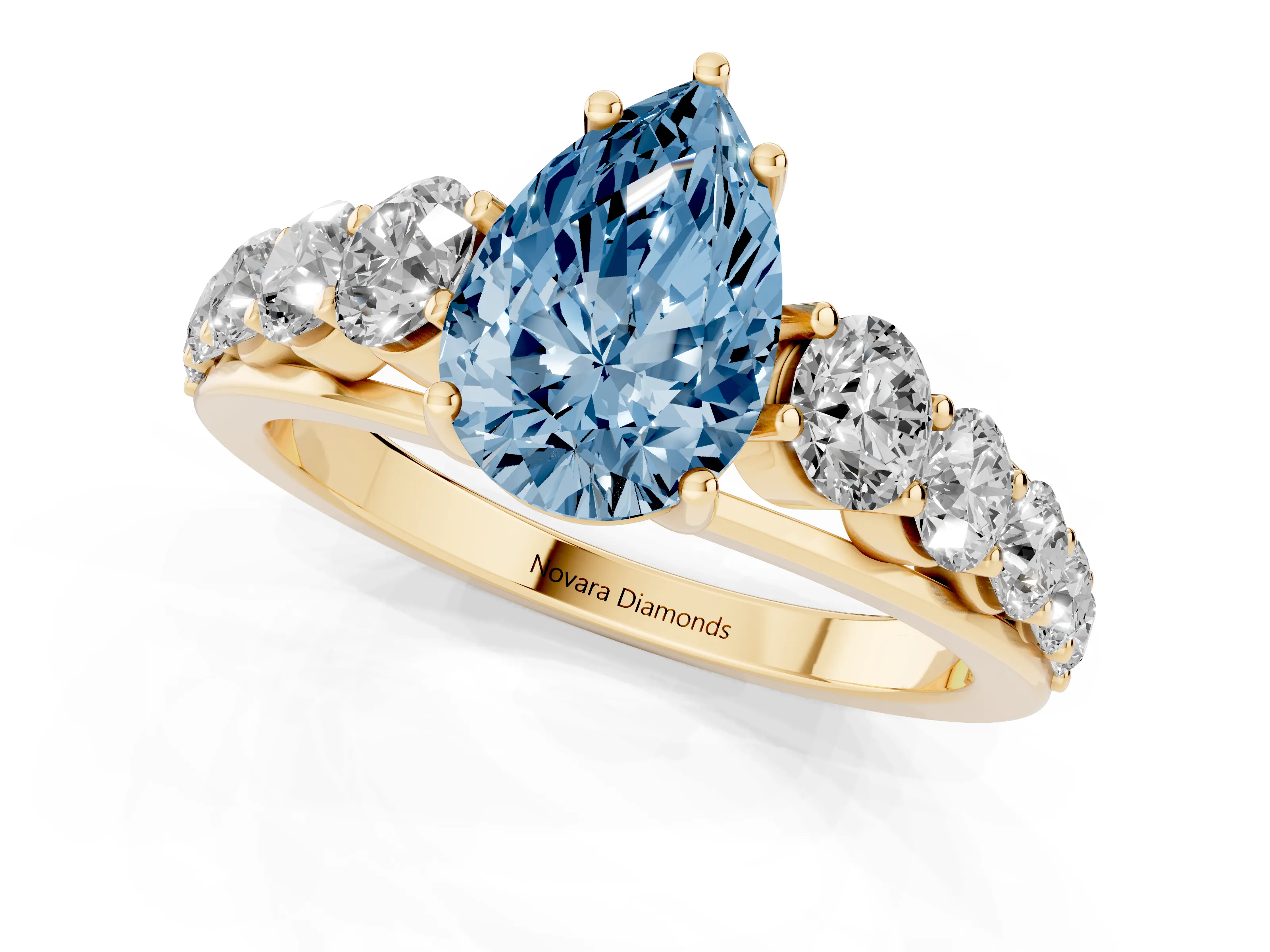 Fancy Blue Pear Cut Diamond Solitaire Ring Set in Yellow gold with Pavé-Set Band and Prong Setting
