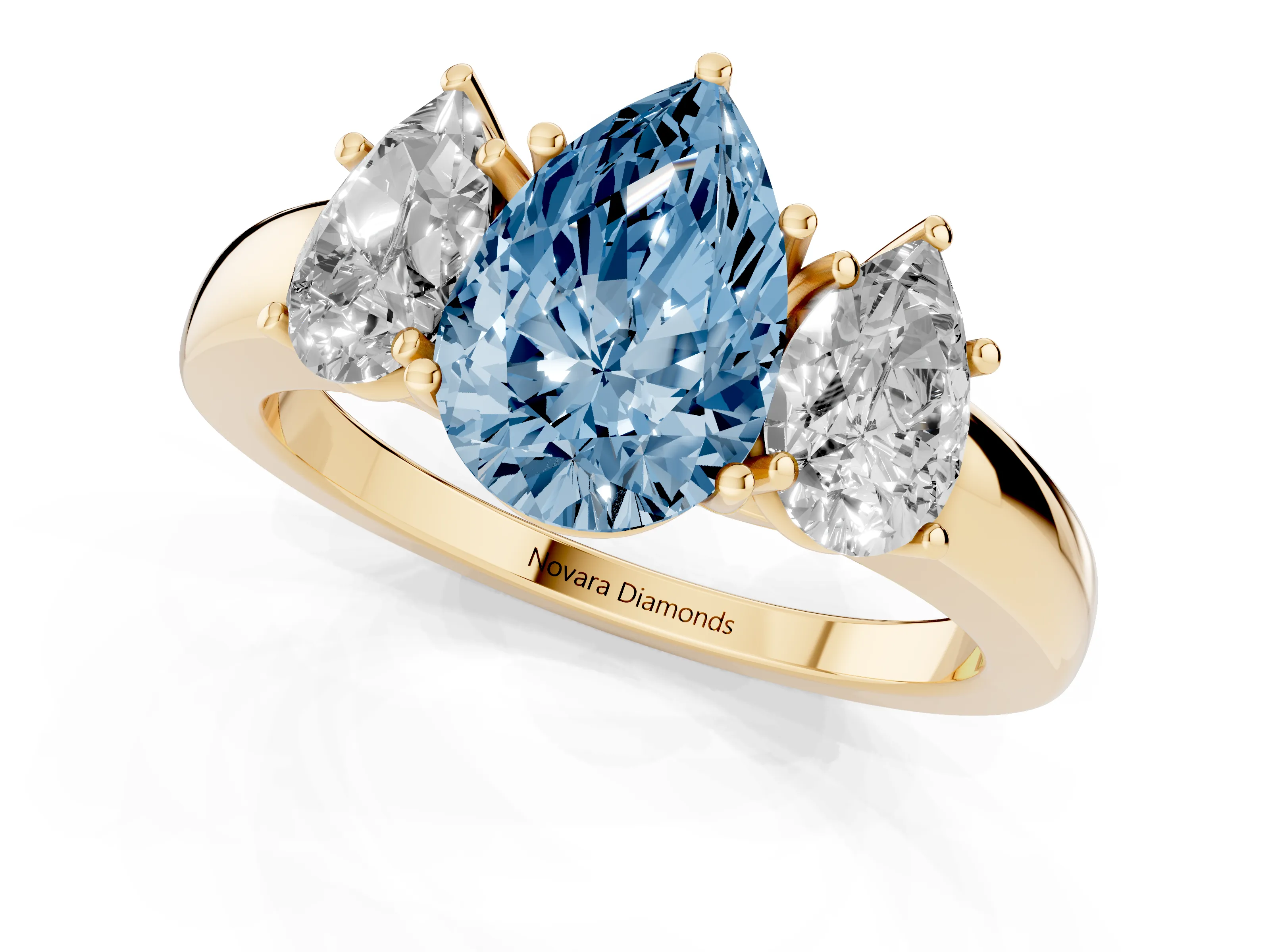 Fancy Blue Pear Cut Diamond Three-Stone Ring Set in Yellow gold with Bold Center and Classic Band