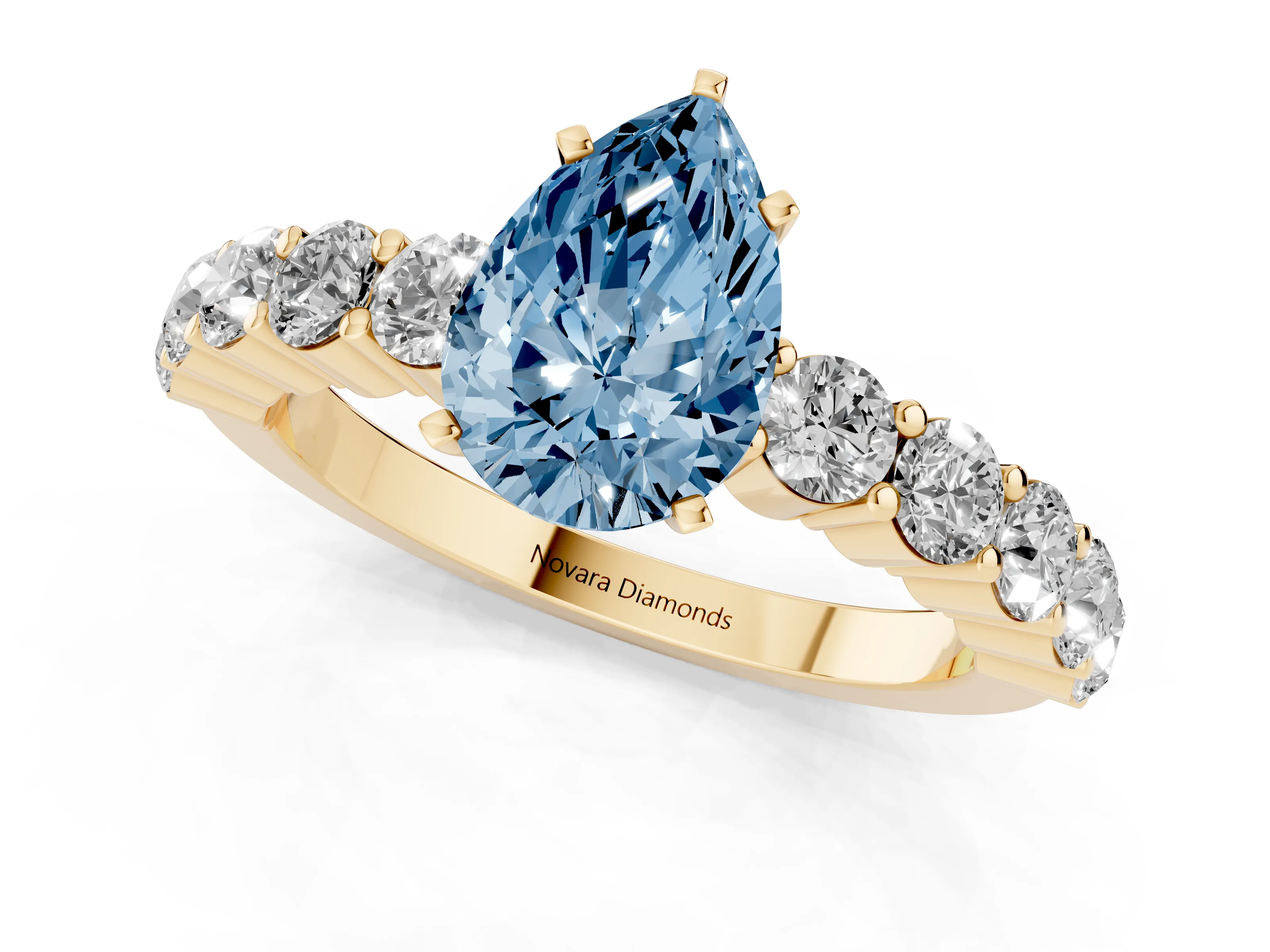 Fancy Blue Pear Cut Diamond Solitaire Ring Set in Yellow gold with Shared Prong Round Side Stones
