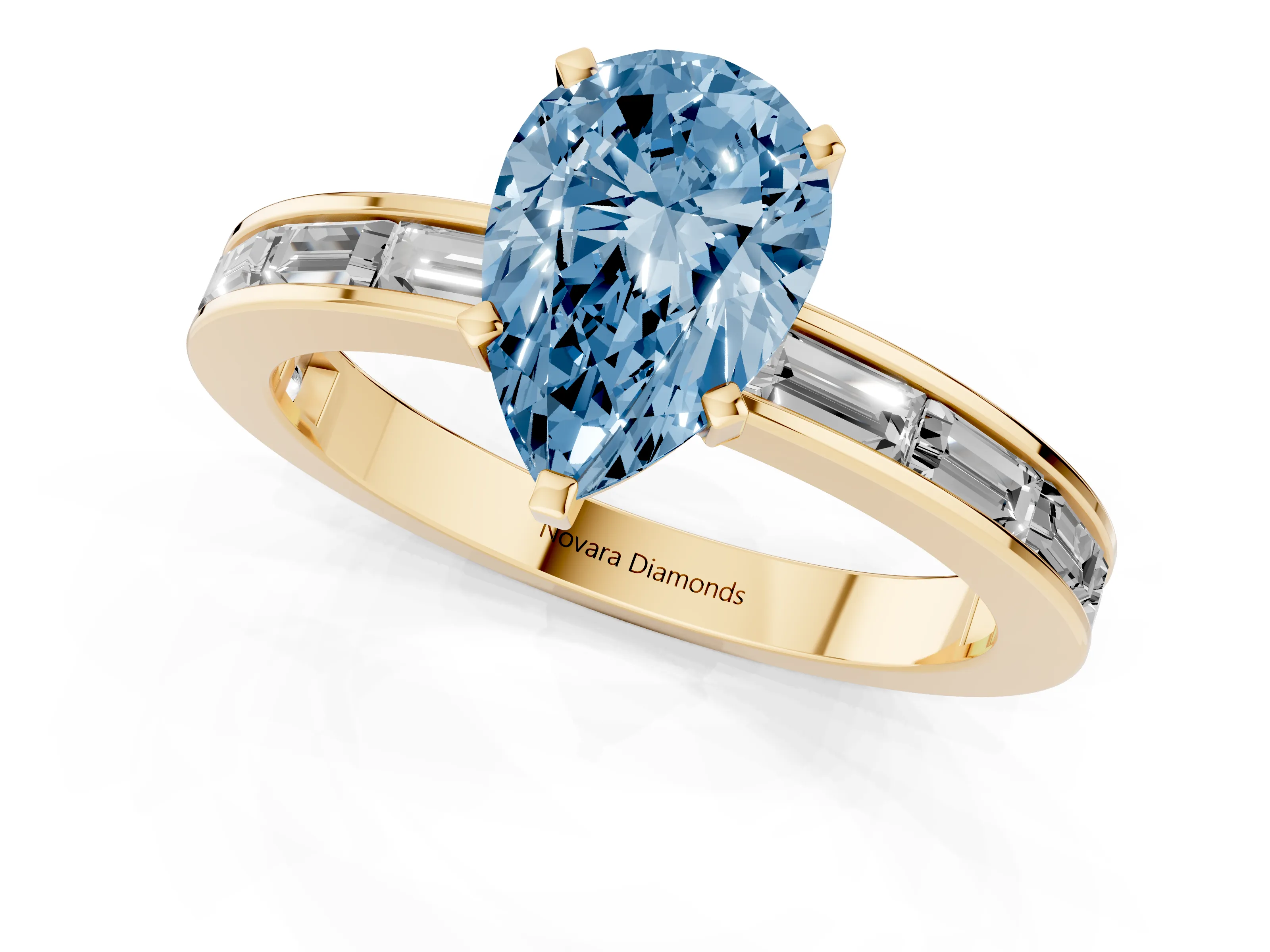 Fancy Blue Pear Cut Diamond Solitaire Ring Set in Yellow gold with Channel-Set Baguette Band and Prong Setting
