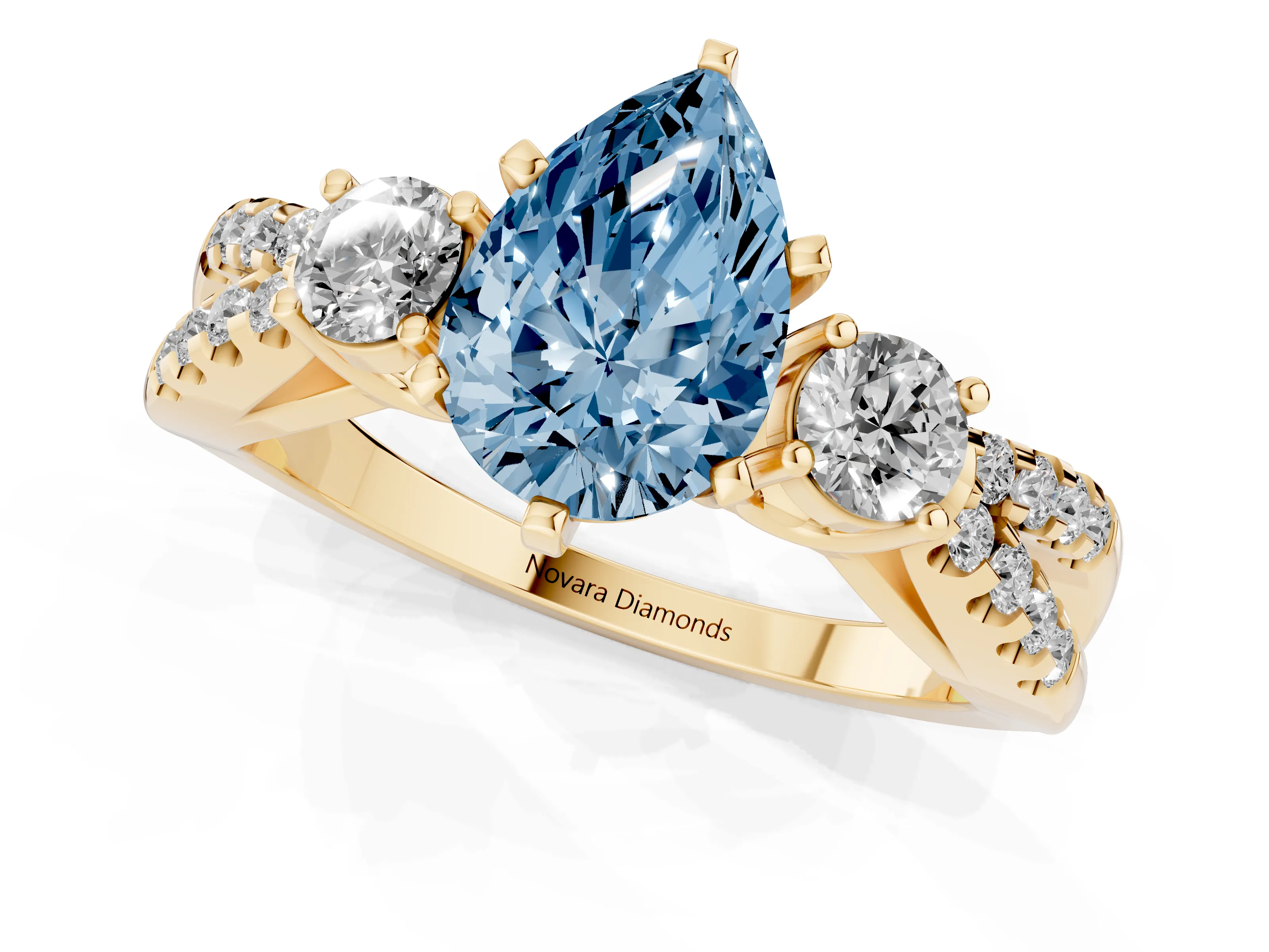 Fancy Blue Pear Cut Diamond Three-Stone Ring Set in Yellow gold with Pavé Split Shank and Prong Setting