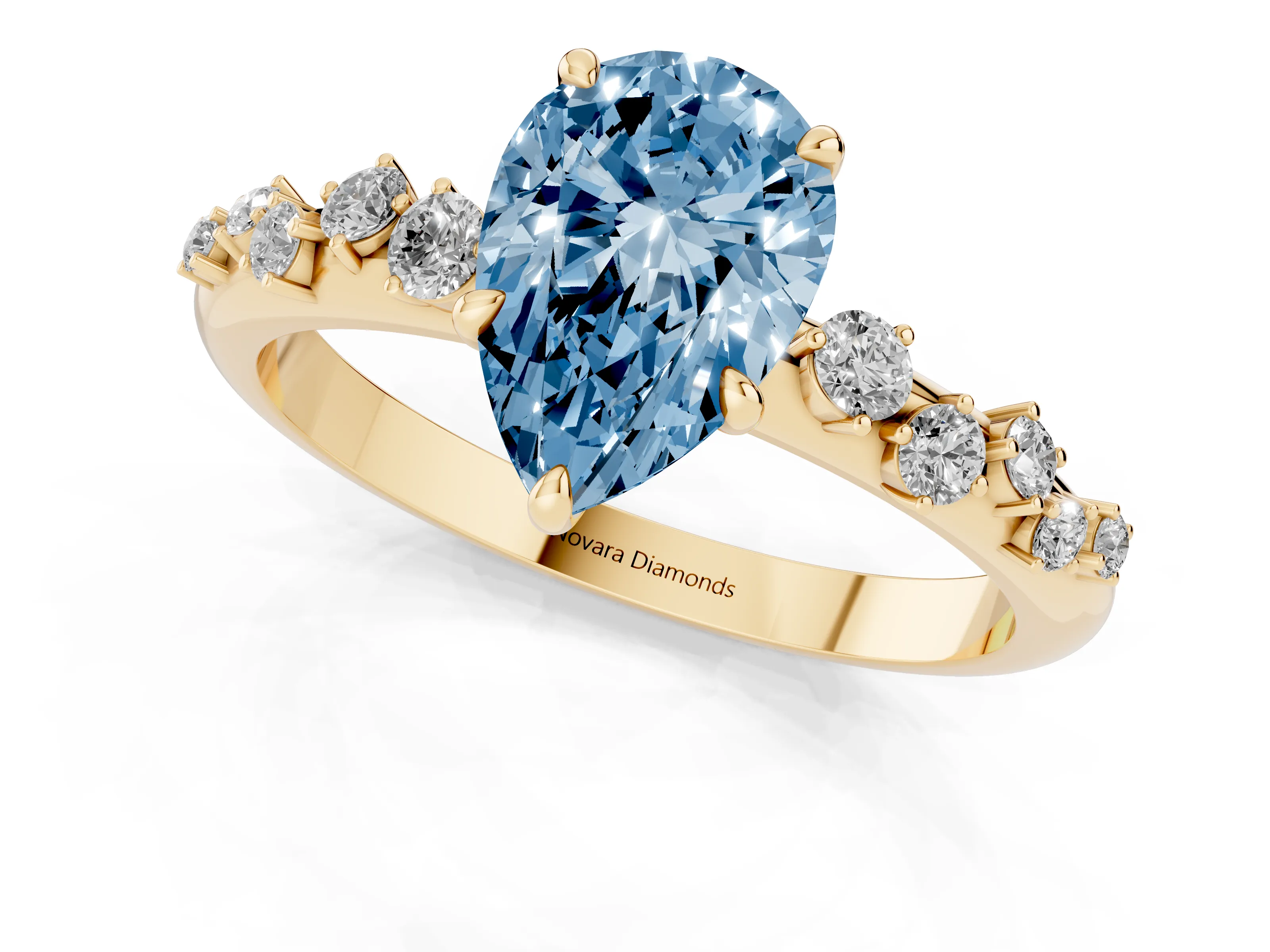 Fancy Blue Pear Cut Diamond Cluster Solitaire Ring Set in Yellow gold with Prong Setting