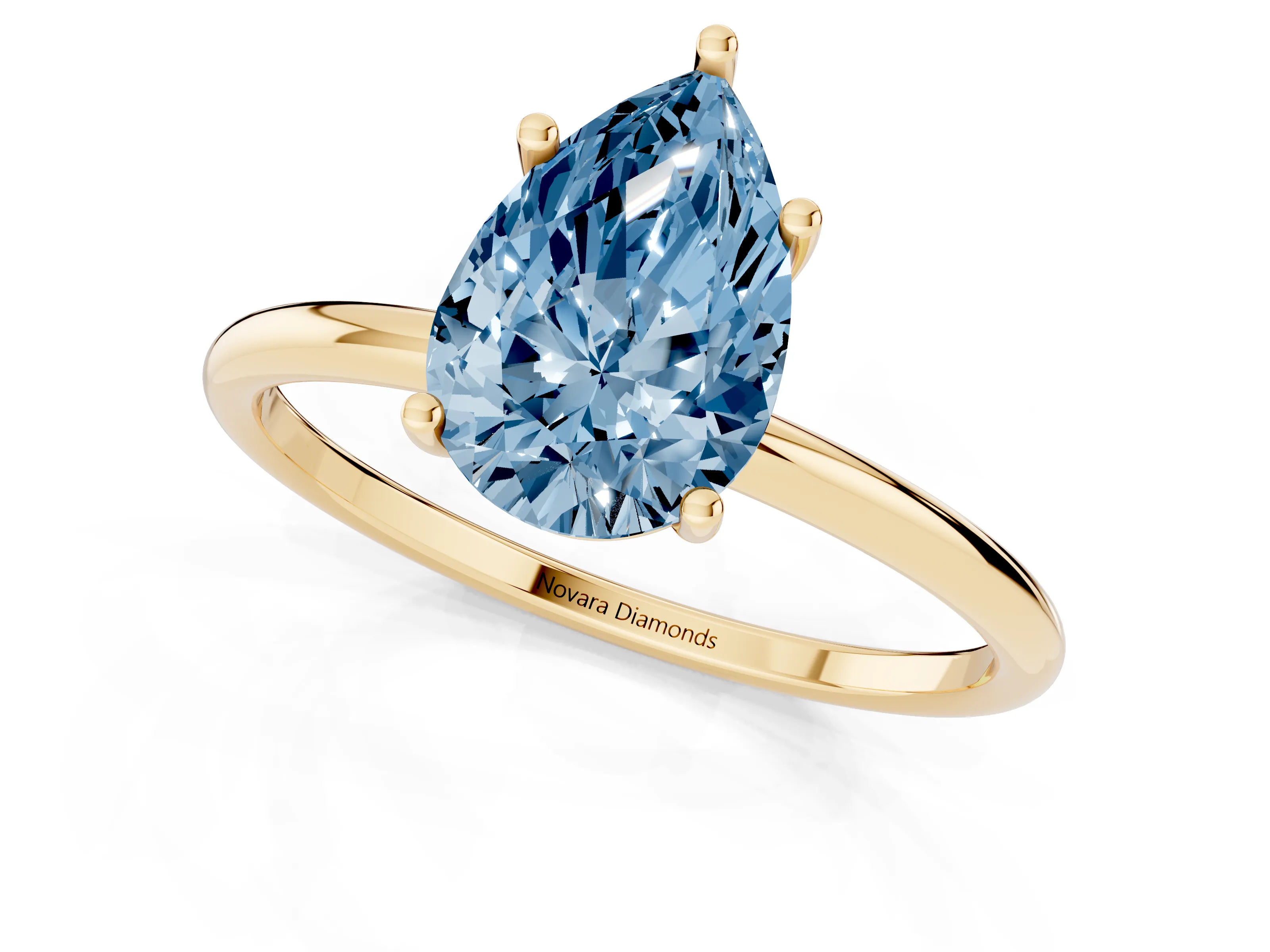 Fancy Blue Pear Cut Diamond Solitaire Engagement Ring Set in Yellow gold with Thin Band and Prong Setting