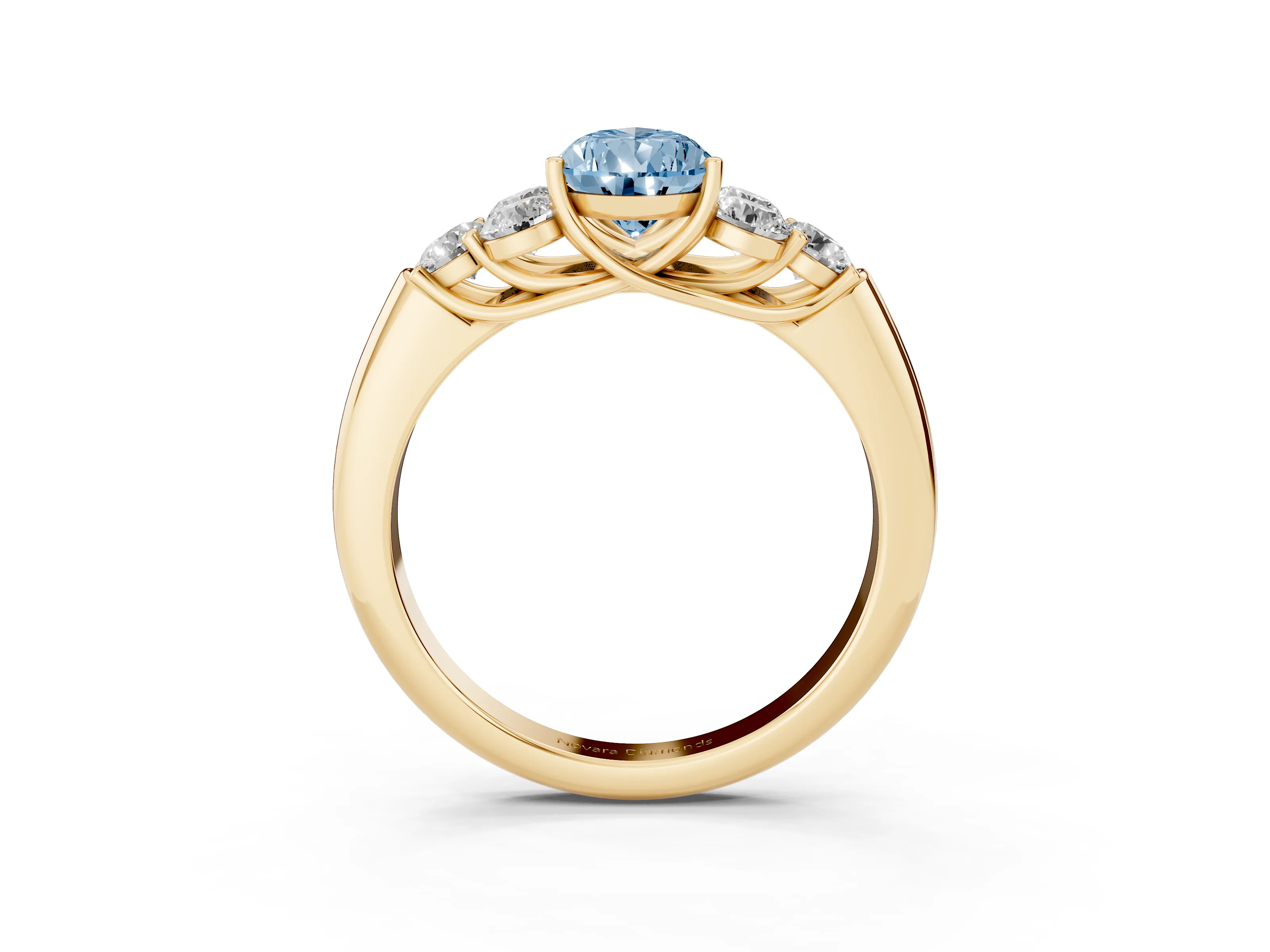Fancy Blue Pear Cut Diamond Cluster Ring Set in Yellow gold with Round Accent Stones and Prong Setting on a Plain Band