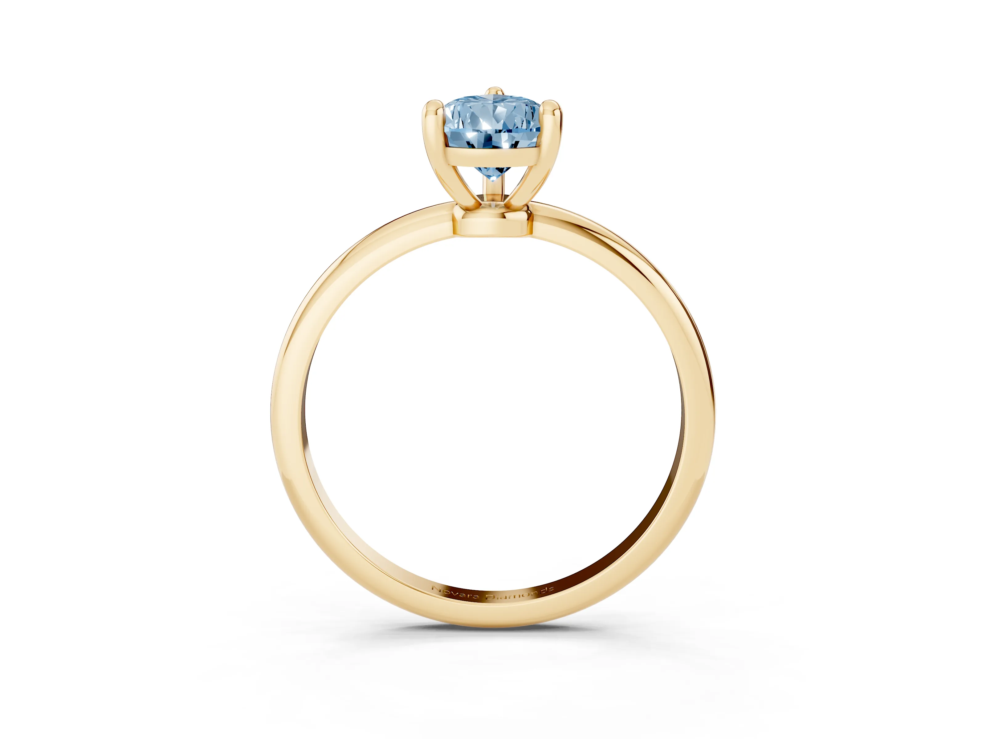 Fancy Blue Pear Cut Diamond Solitaire Ring Set in Yellow gold with Secure Prong Setting on a Classic Band