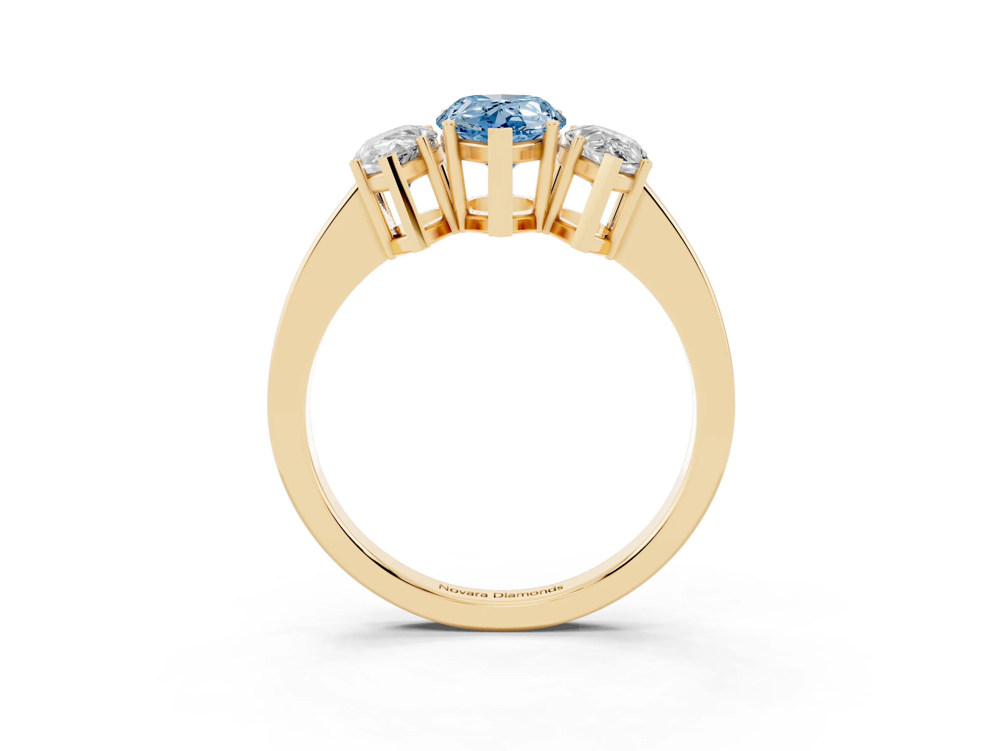 Fancy Blue Pear Cut Diamond Three-Stone Engagement Ring Set in Yellow gold with Flat Band