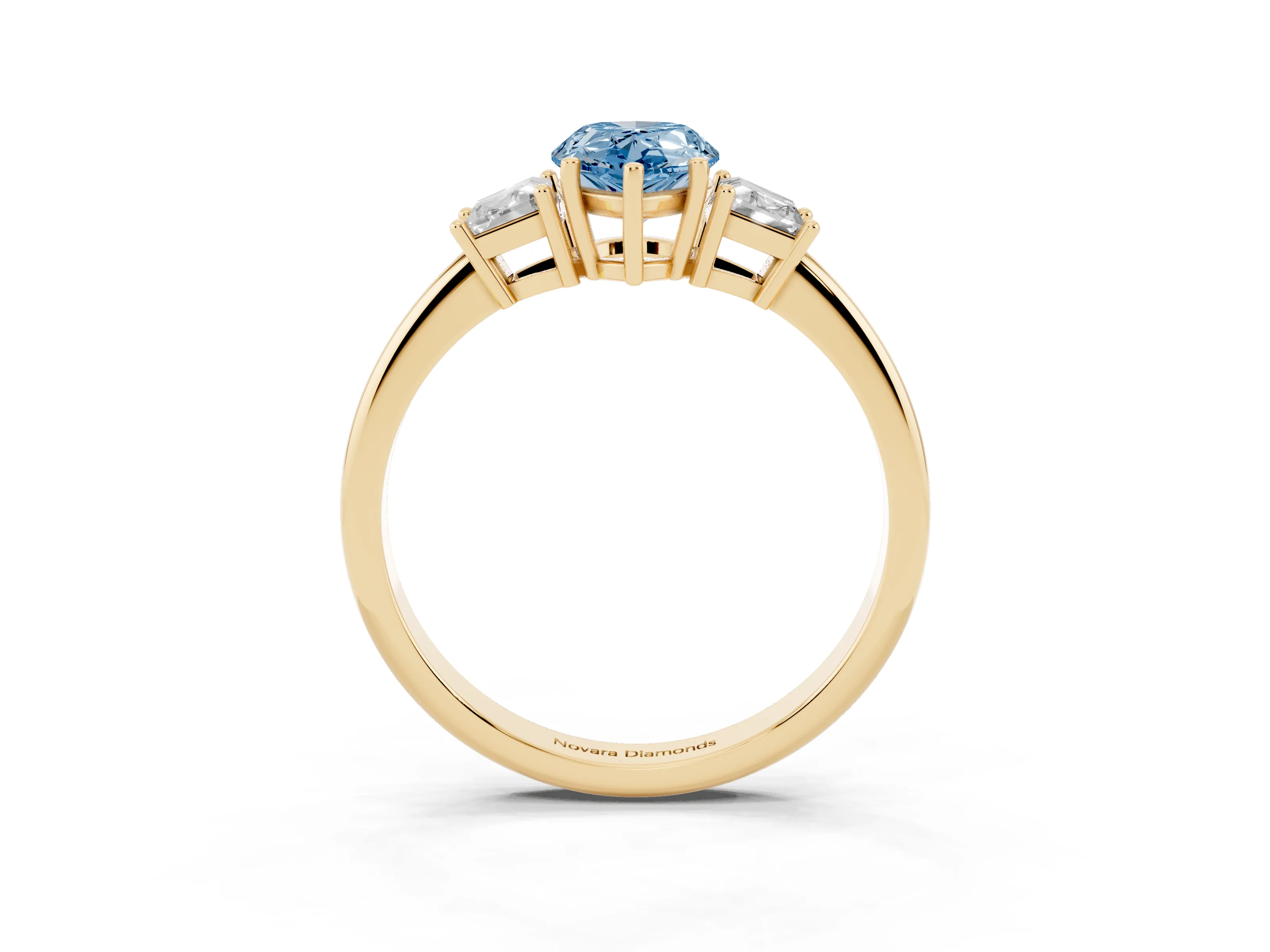 Fancy Blue Pear Cut Diamond Three-Stone Ring Set in Yellow gold with Trapezoid Side Stones and Prong Setting