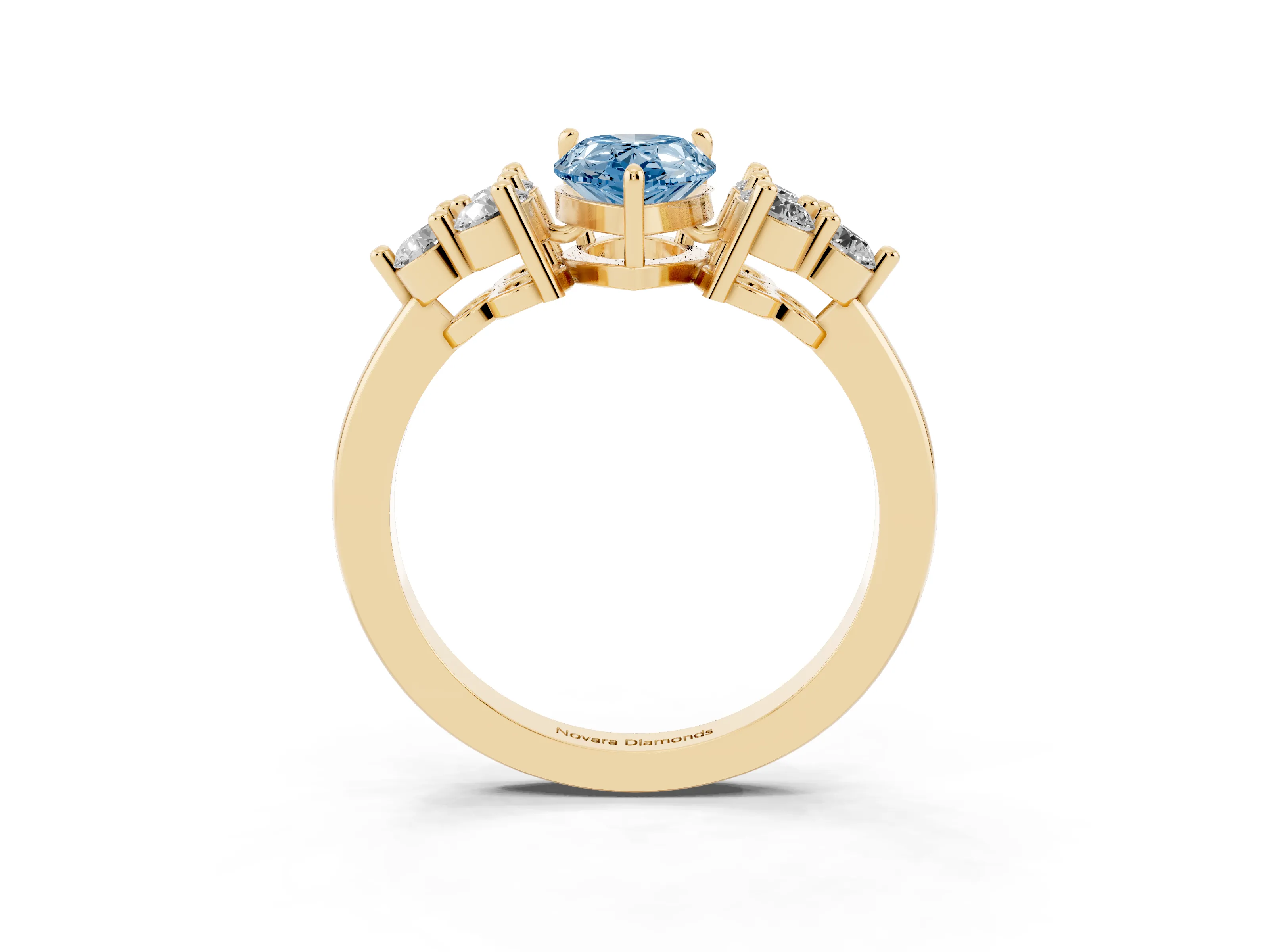 Fancy Blue Pear Cut Diamond Solitaire Ring Set in Yellow gold with Cluster Accents on Each Side