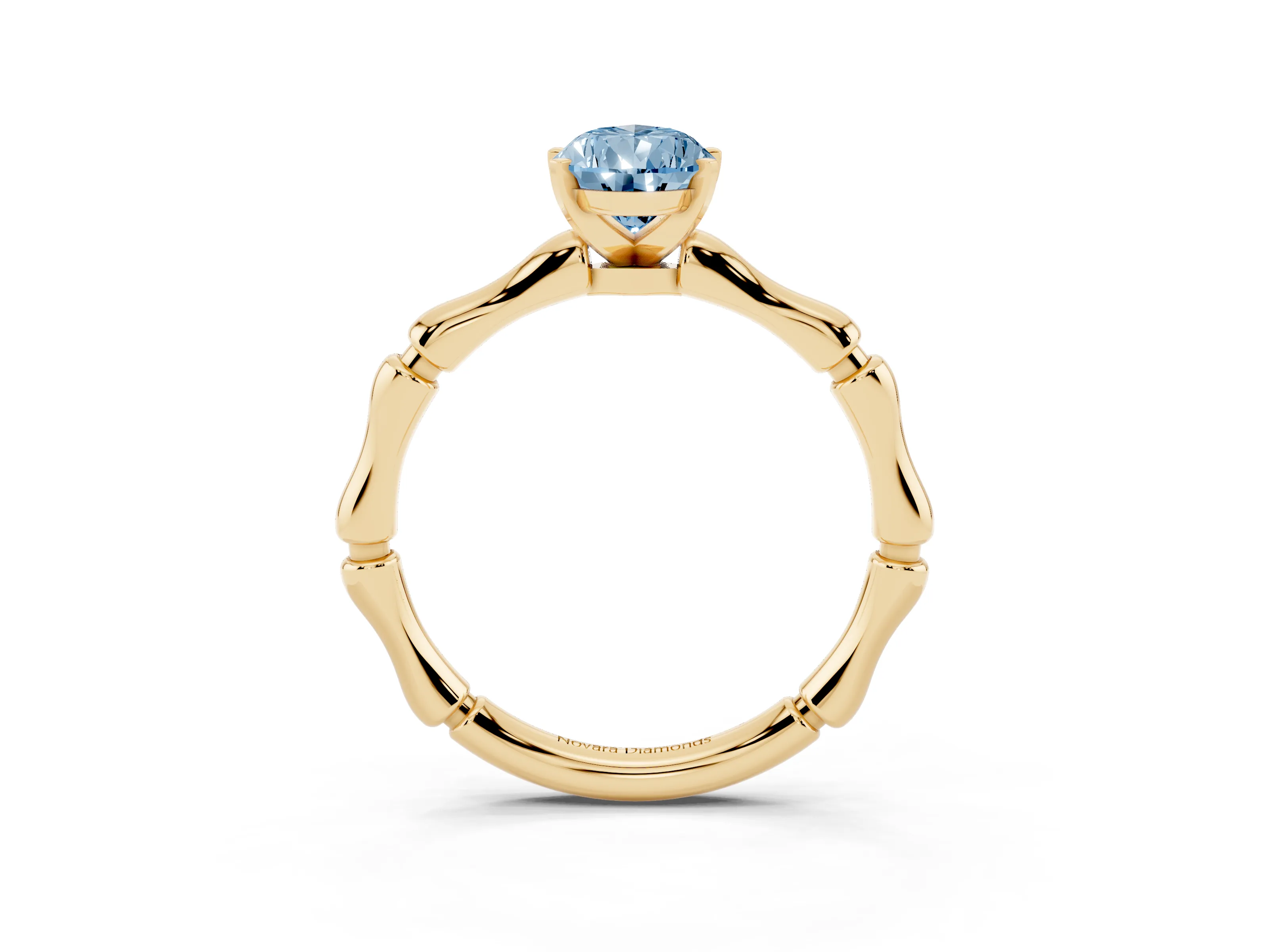 Fancy Blue Pear Cut Diamond Solitaire Ring Set in Yellow gold with Bamboo Band and Prong Setting