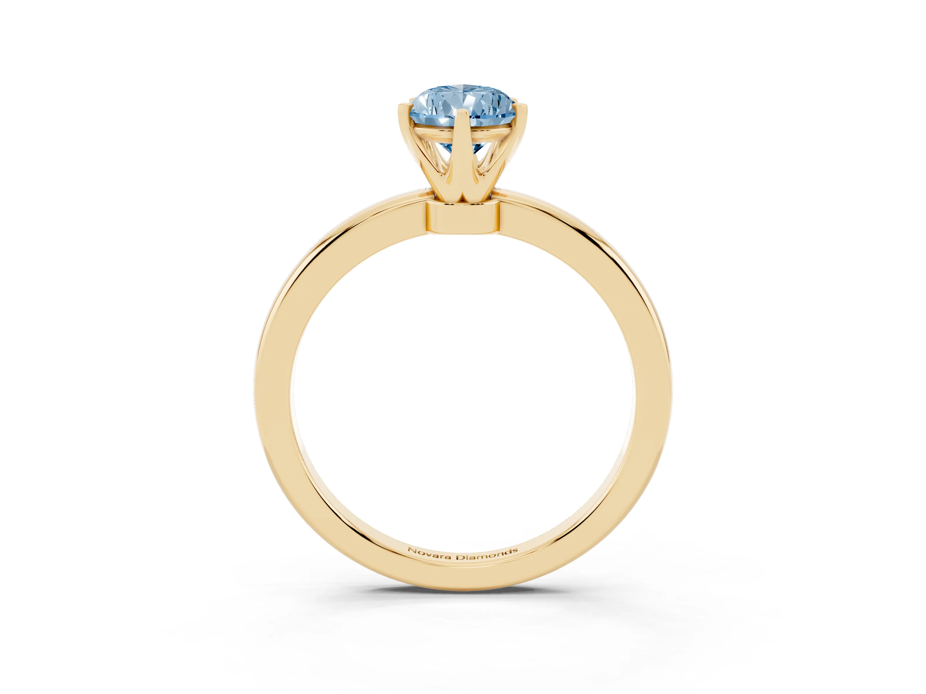 Fancy Blue Pear Cut Diamond Solitaire Ring Set in Yellow gold with Raised Prong Setting on a Classic Band