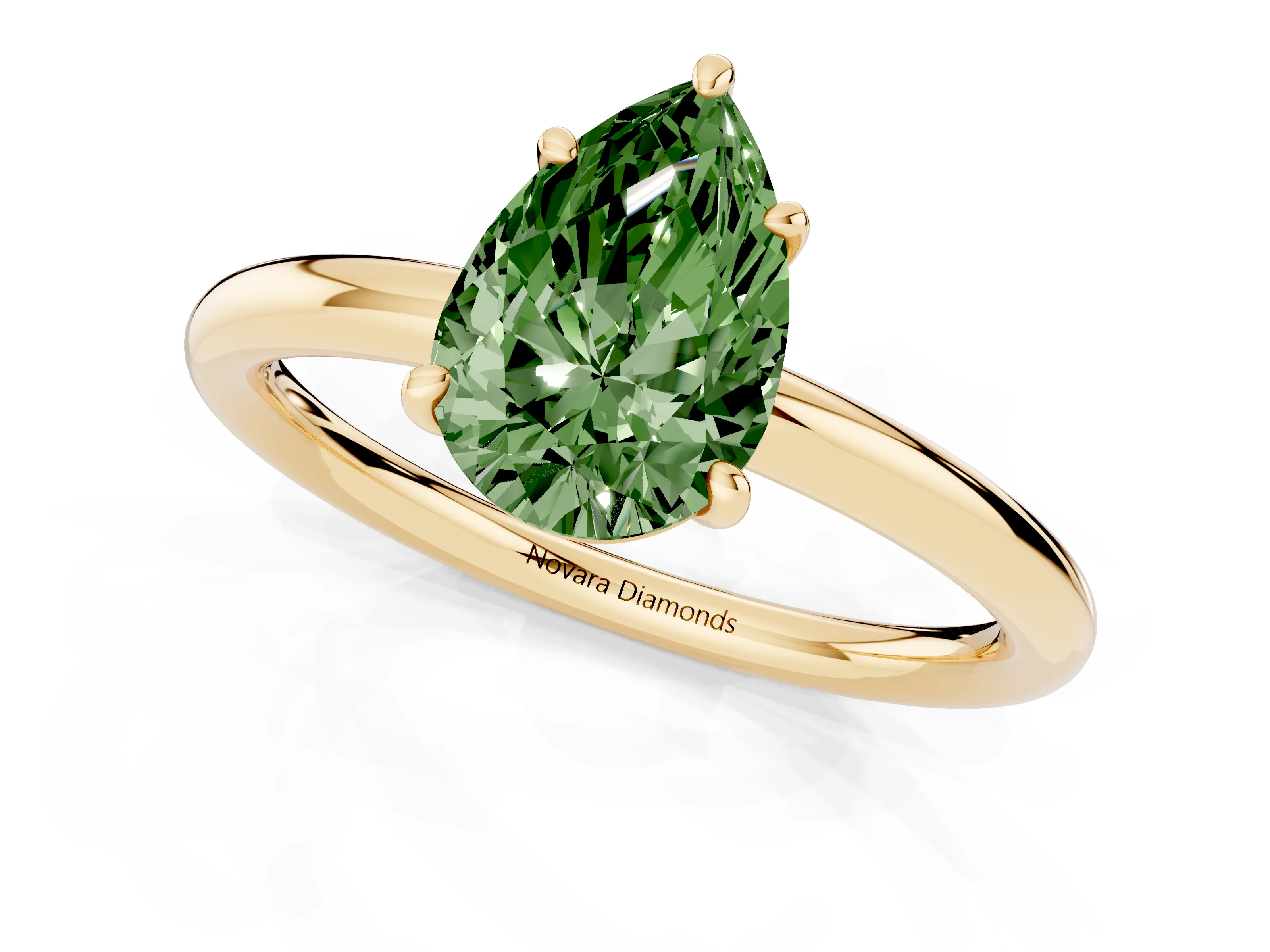 Fancy Green Pear Cut Diamond Solitaire Ring Set in Yellow gold with Prong Setting on a Polished Plain Band