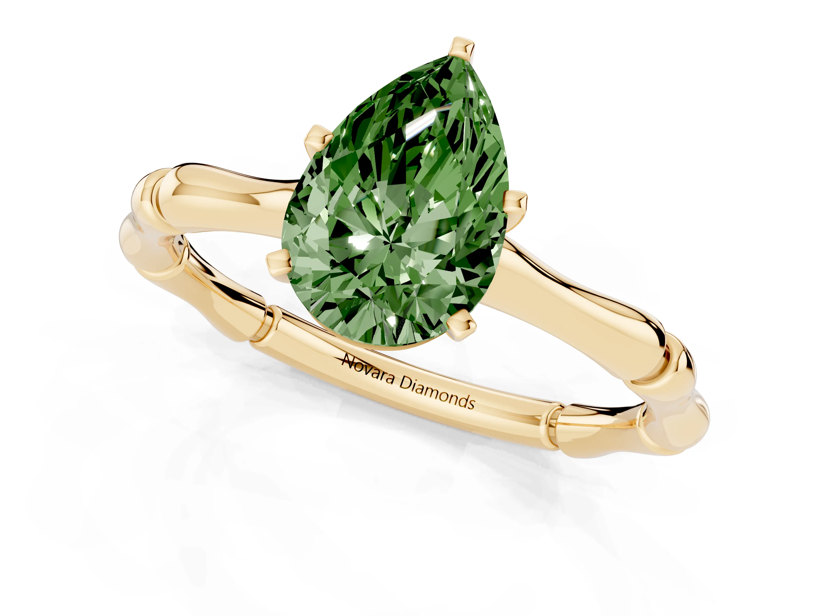 Fancy Green Pear Cut Diamond Solitaire Ring Set in Yellow gold with Bamboo Band and Prong Setting
