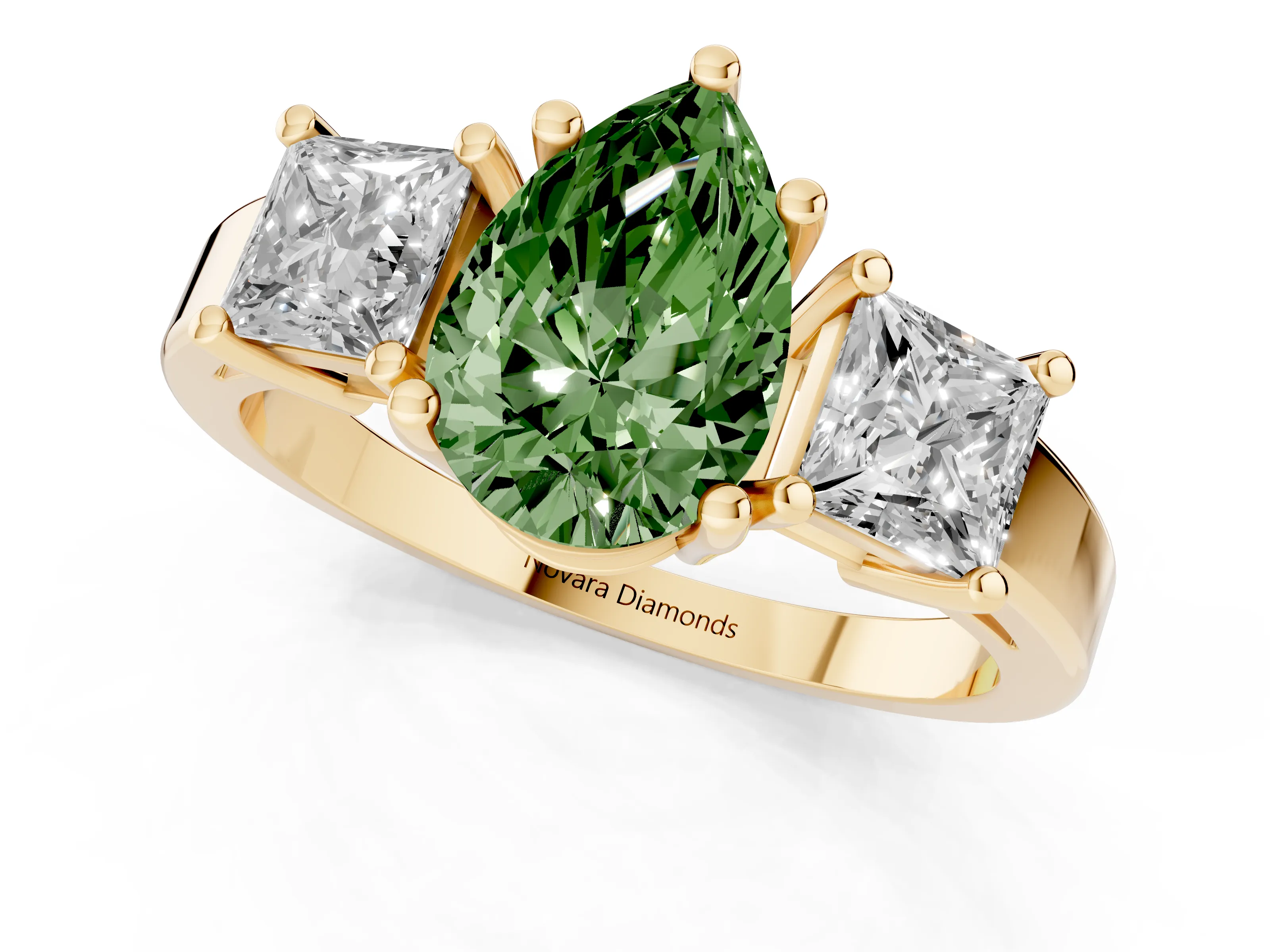 Fancy Green Three-Stone Pear Cut Diamond Solitaire Ring Set in Yellow gold with Prong Setting
