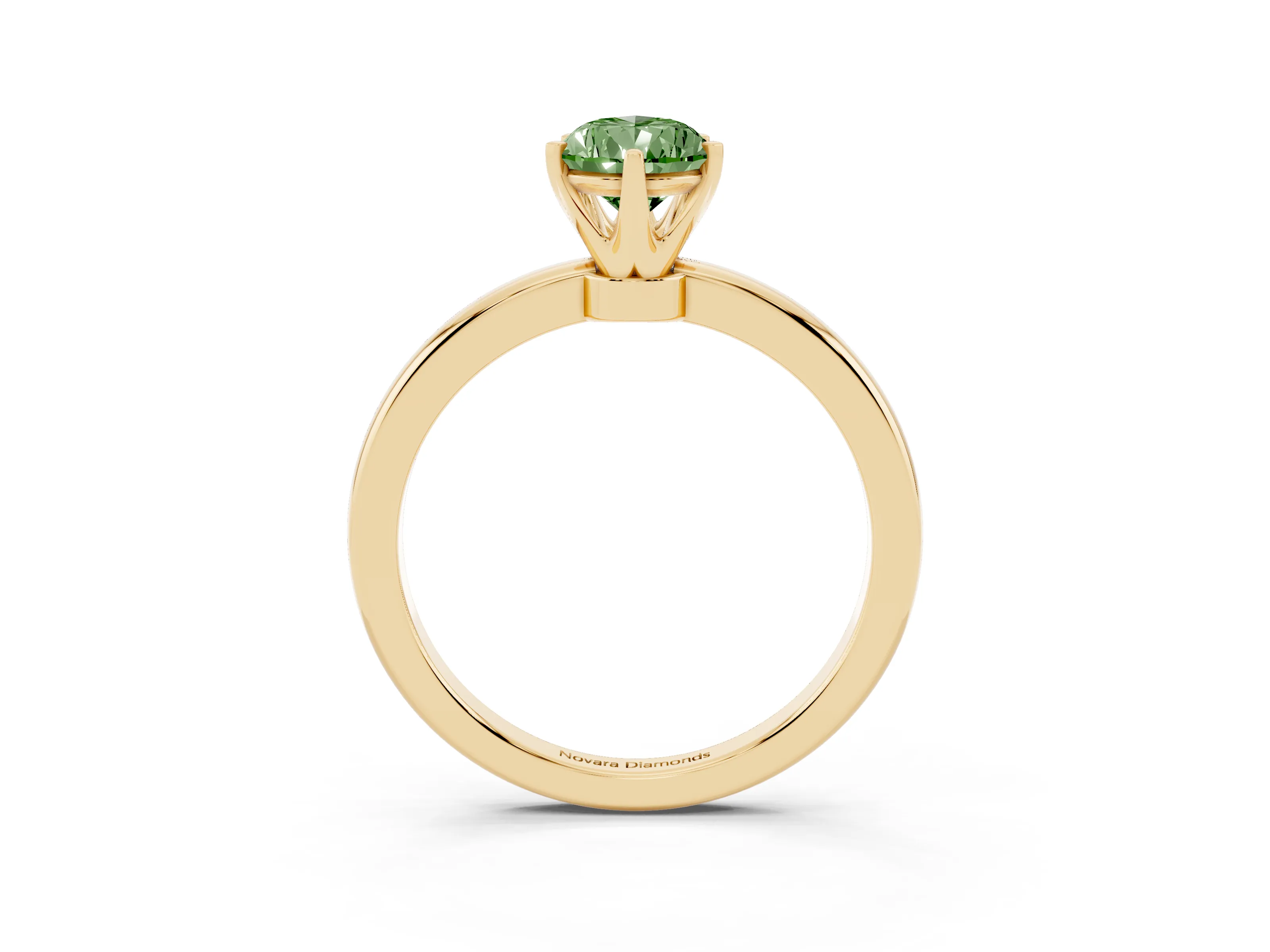 Fancy Green Pear Cut Diamond Solitaire Ring Set in Yellow gold with Raised Prong Setting on a Classic Band