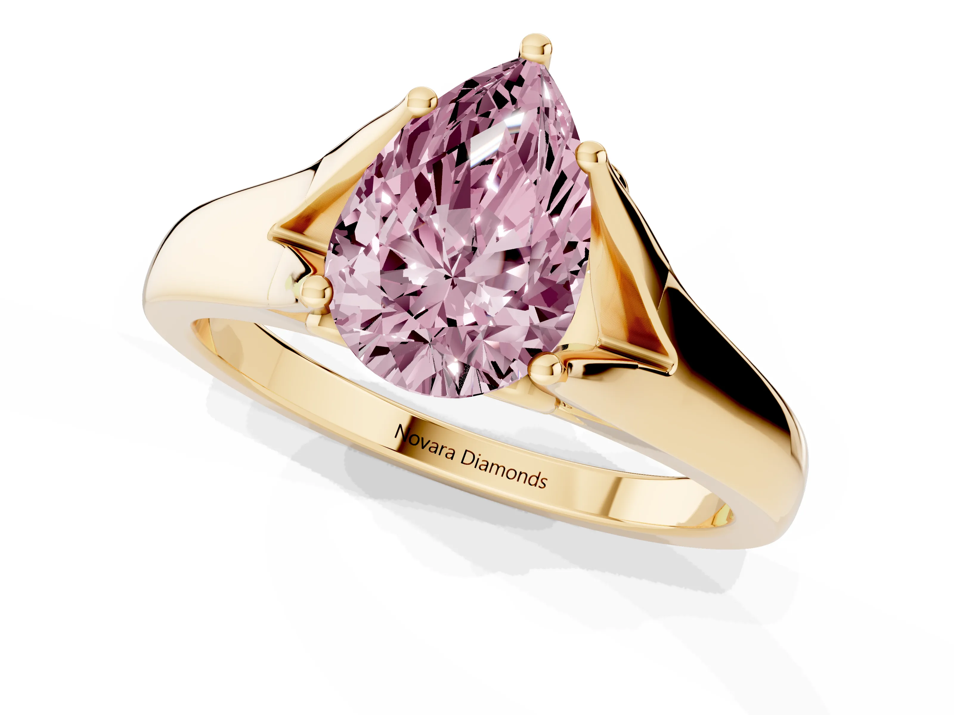 Fancy Pink Pear Cut Diamond Solitaire Ring Set in Yellow gold with Arched Cathedral Band and Prong Setting