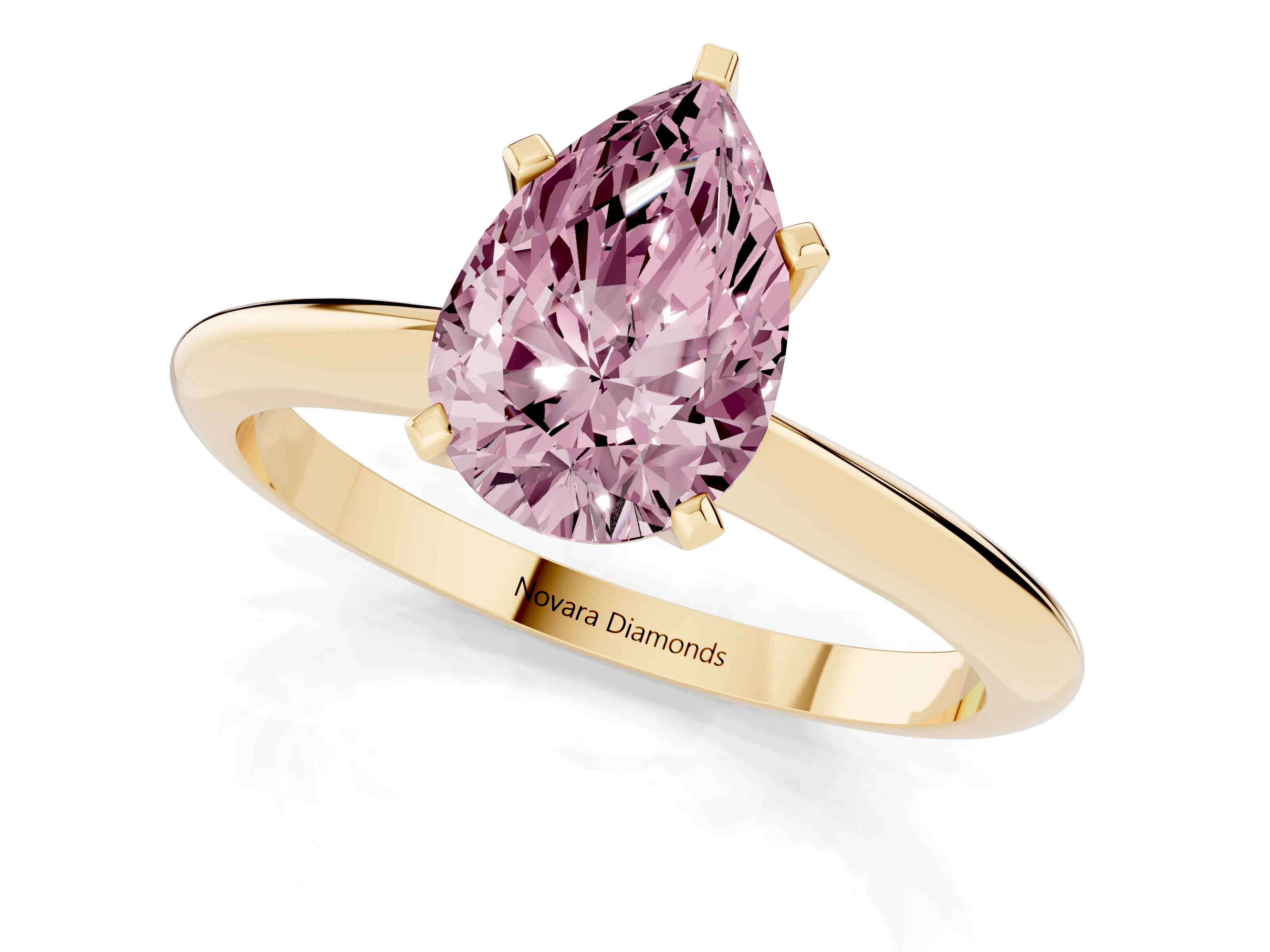 Fancy Pink Pear Cut Diamond Solitaire Ring Set in Yellow gold with Prong Setting on a Plain Round Band