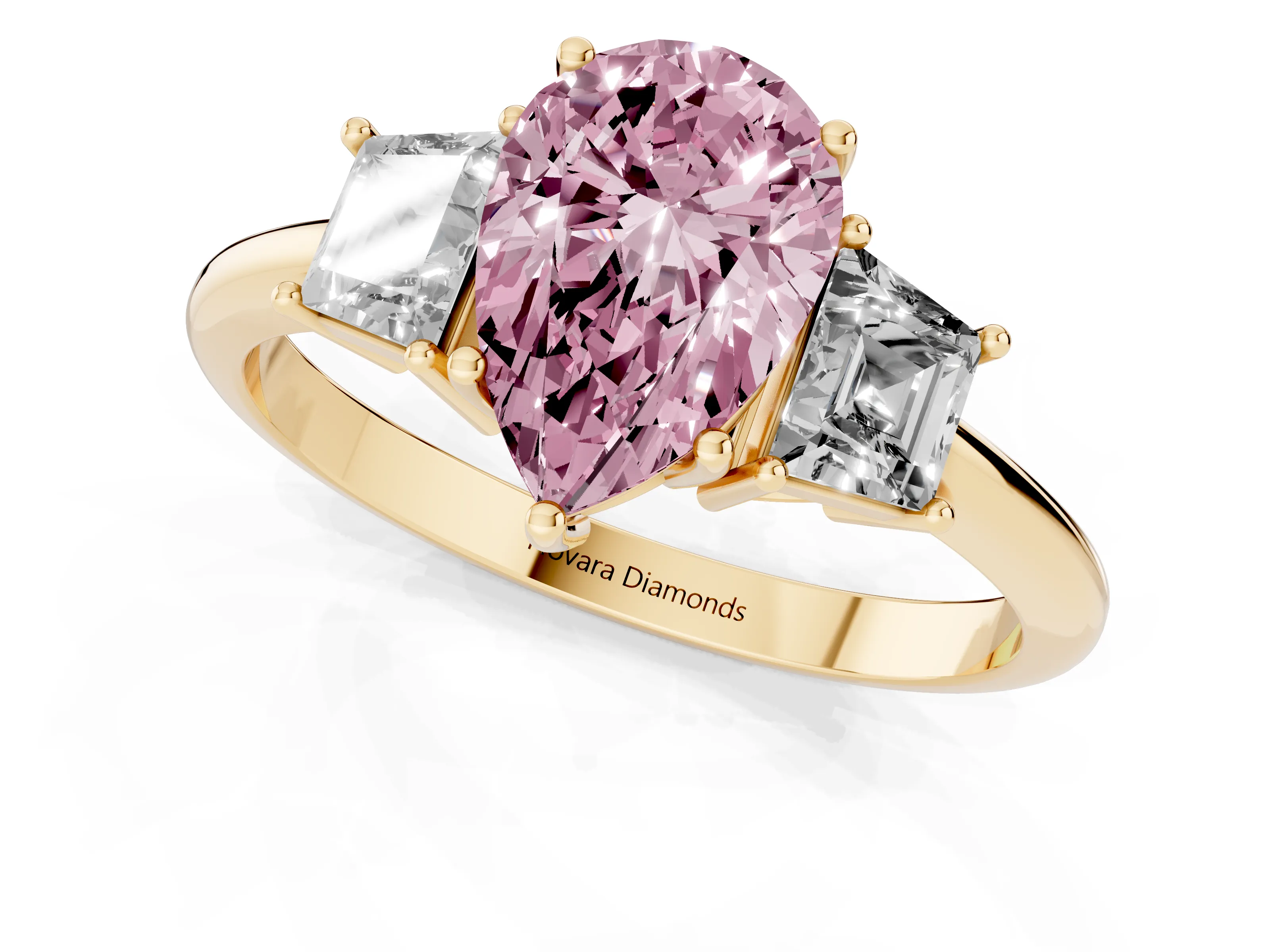 Fancy Pink Pear Cut Diamond Three-Stone Ring Set in Yellow gold with Trapezoid Side Stones and Prong Setting