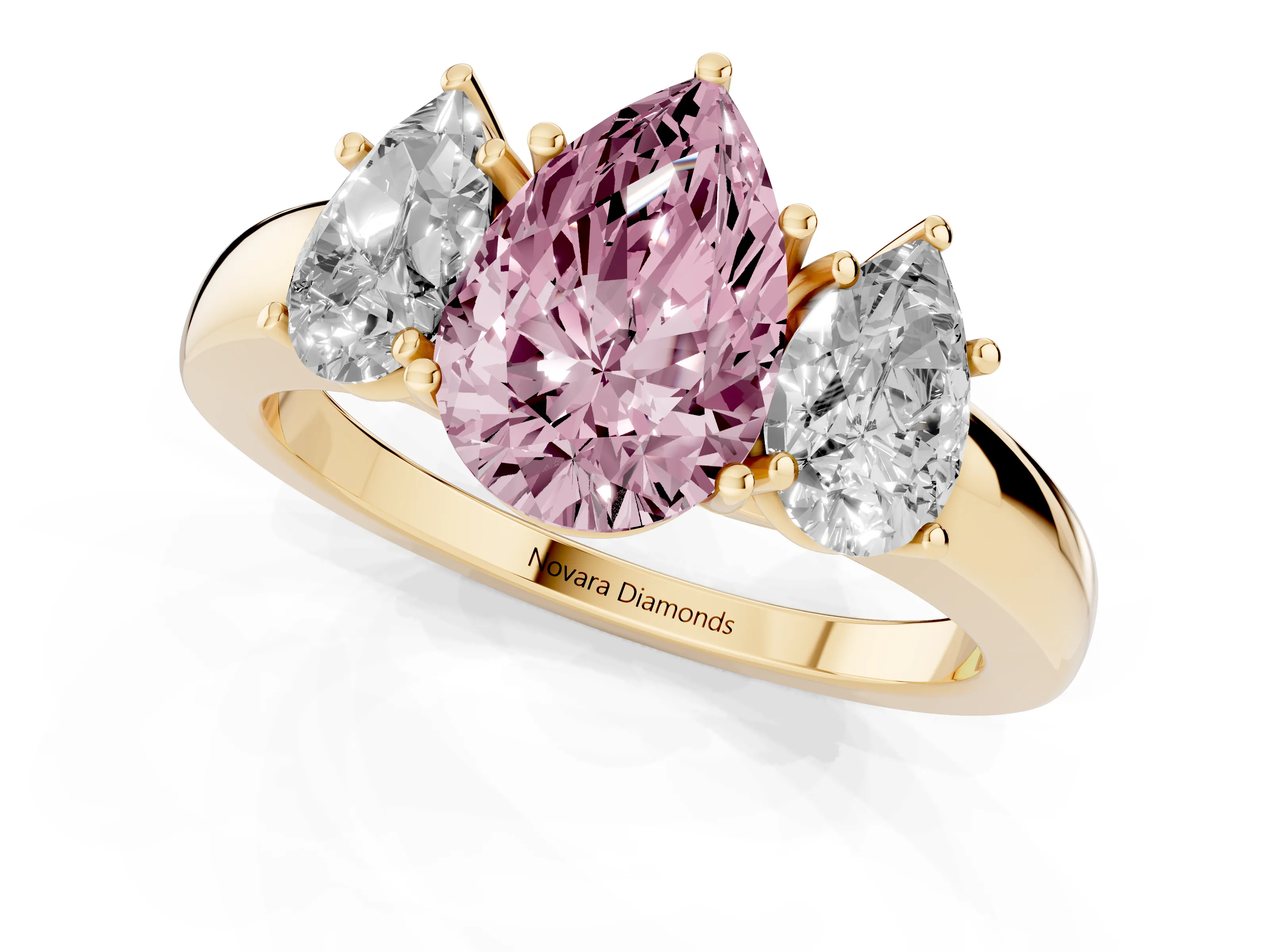 Fancy Pink Pear Cut Diamond Three-Stone Ring Set in Yellow gold with Bold Center and Classic Band