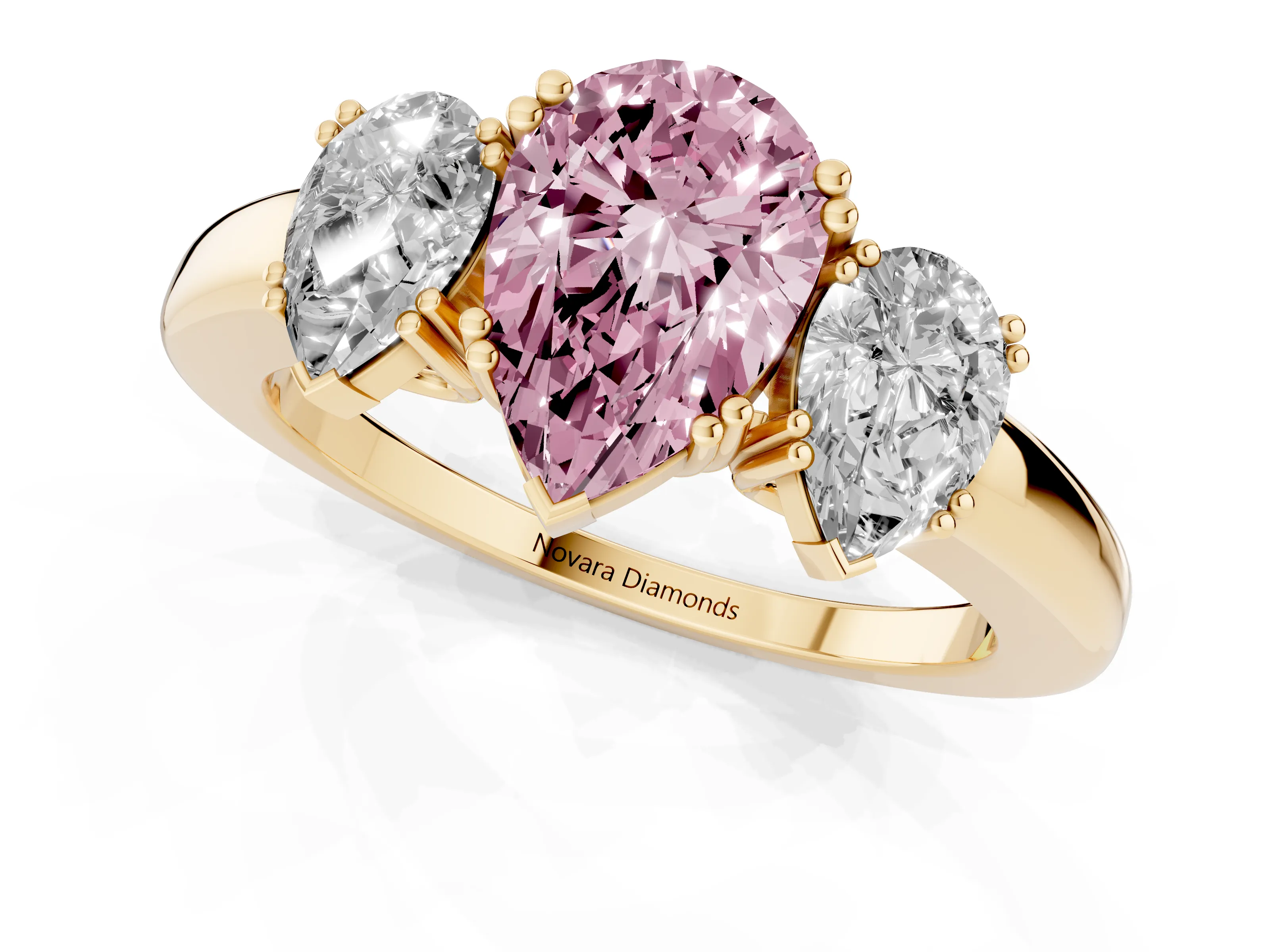 Fancy Pink Pear Cut Diamond Three-Stone Ring Set in Yellow gold with Polished Channel-Set Band