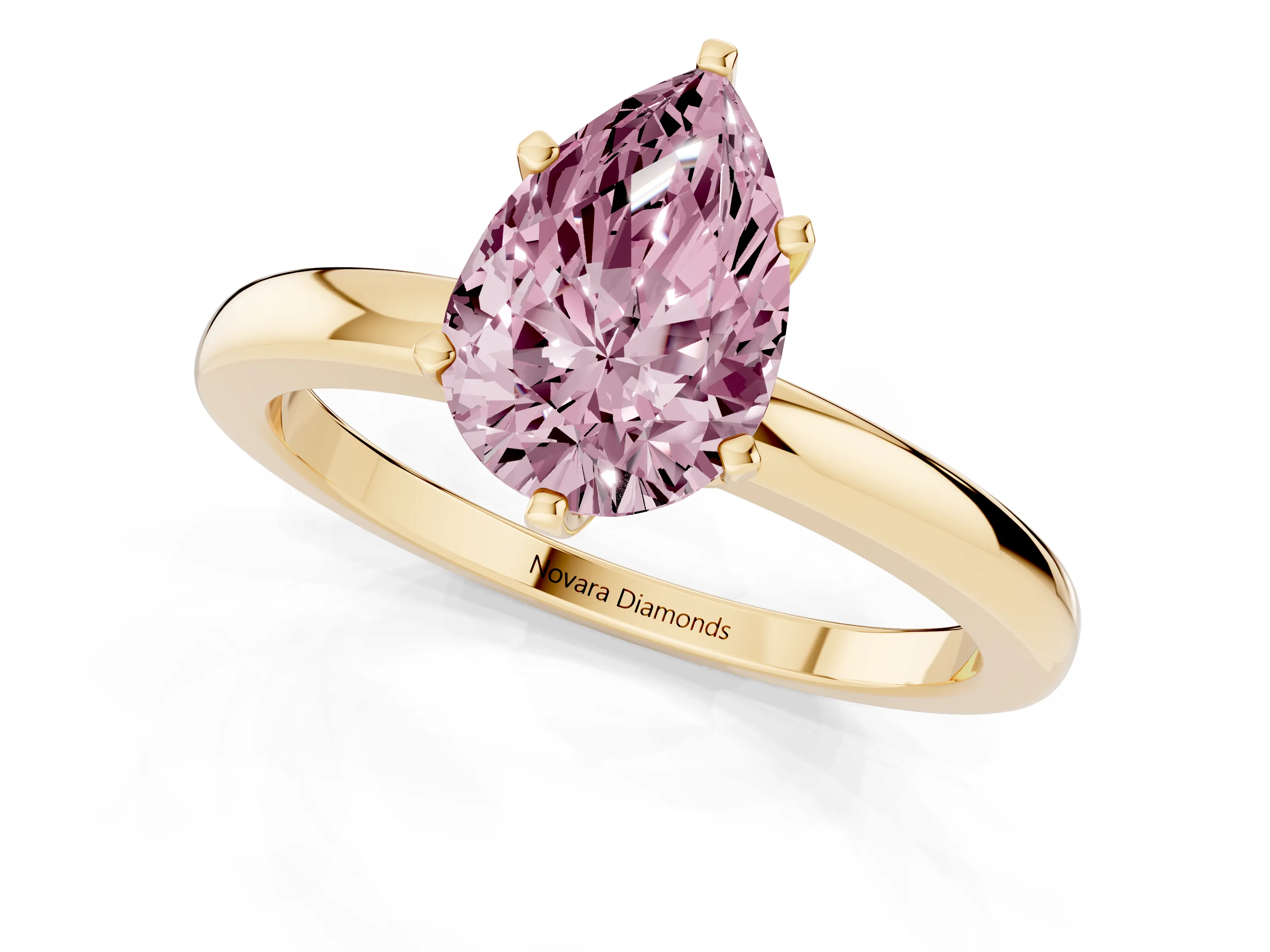 Fancy Pink Pear Cut Diamond Solitaire Ring Set in Yellow gold with Raised Prong Setting on a Classic Band