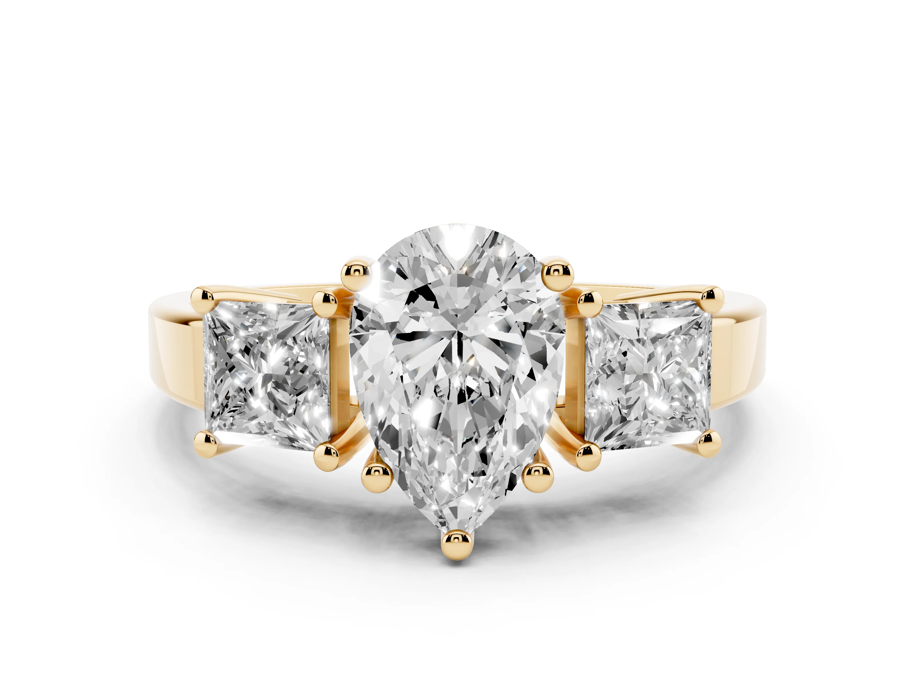 Three-Stone Pear Cut Diamond Solitaire Ring Set in Yellow gold with Prong Setting