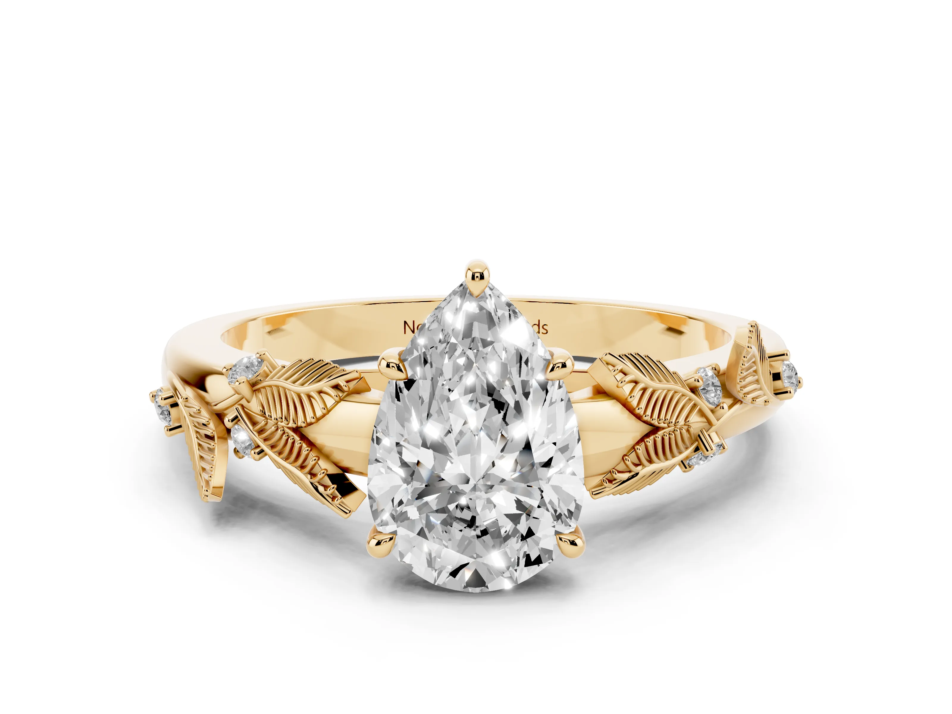 Pear Cut Diamond Solitaire Ring Set in Yellow gold with Leaf Motif Band