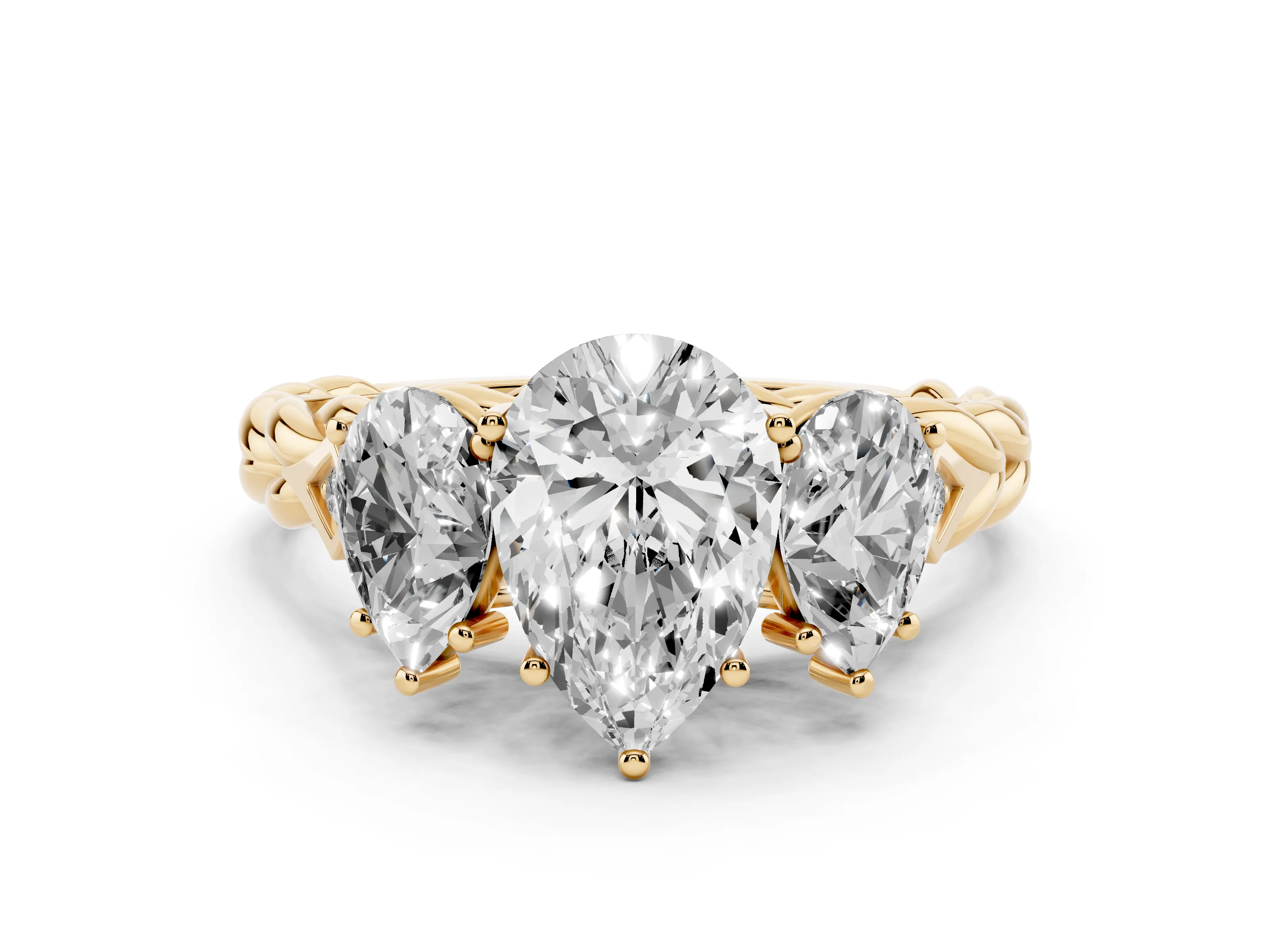 Pear Cut Diamond Three-Stone Ring Set in Yellow gold with Braided Band