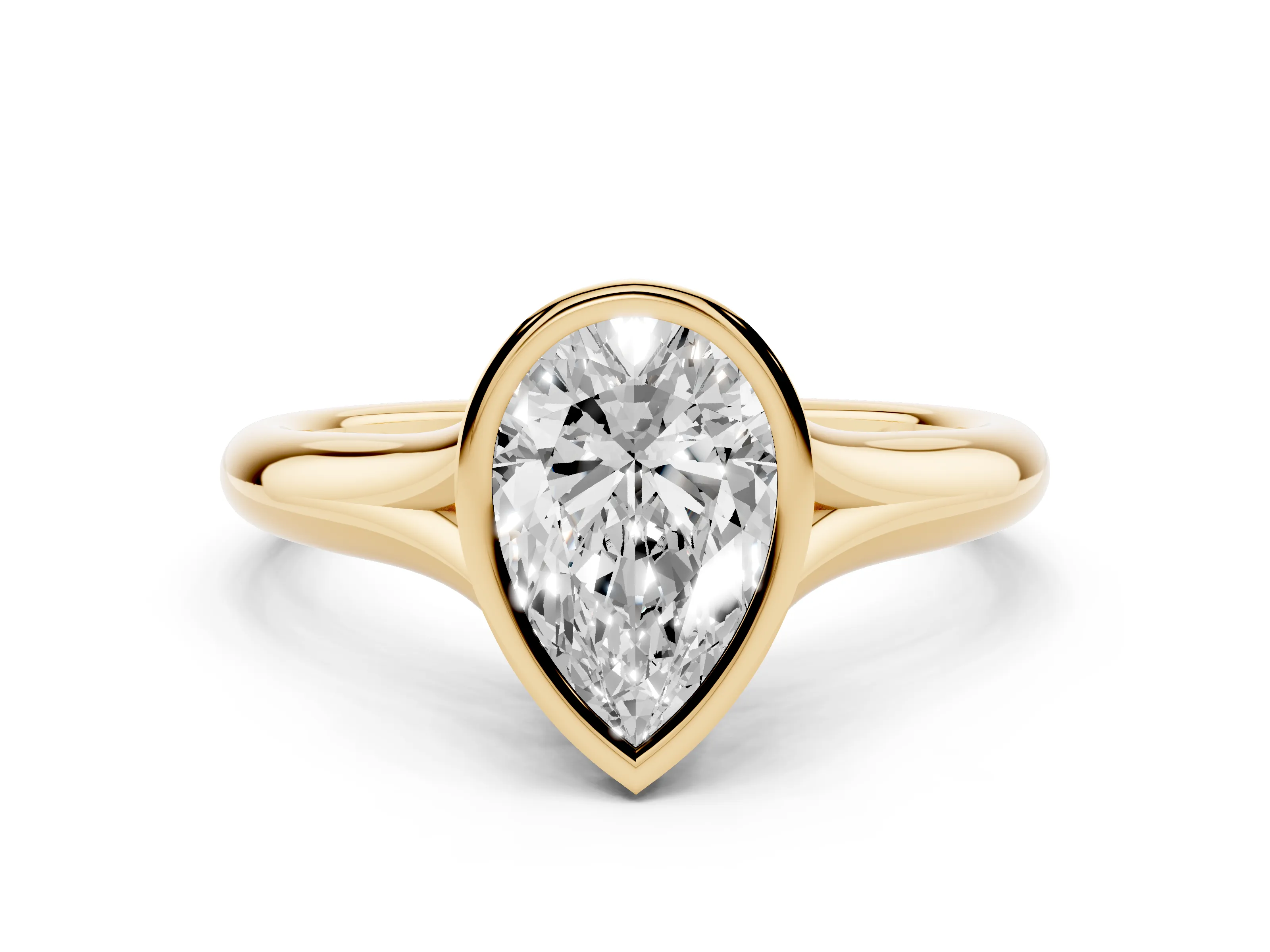 Bezel Set Pear Cut Diamond Solitaire Ring Set in Yellow gold with Smooth Band