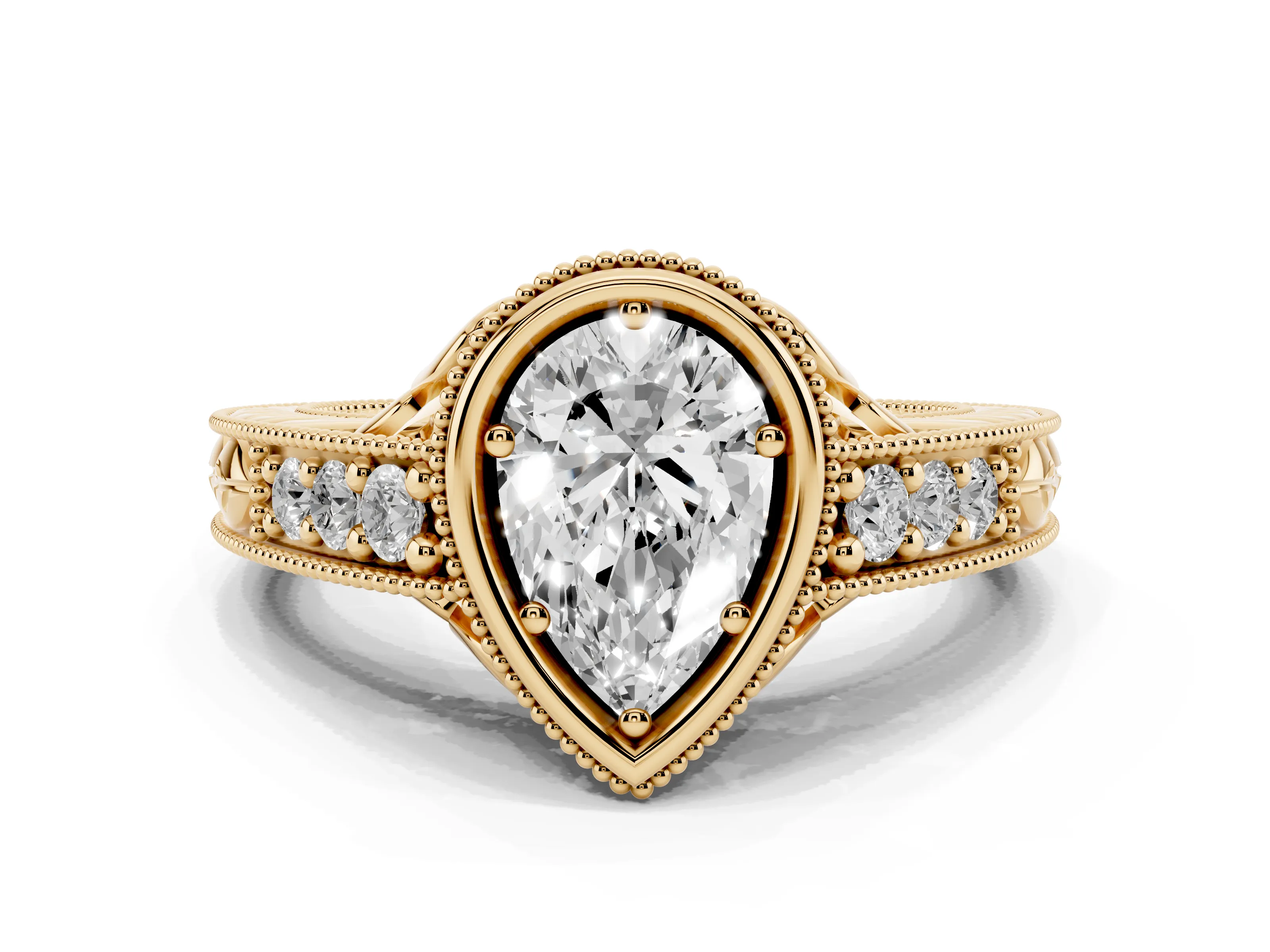 Bezel Set Pear Cut Diamond Milgrain Pavé Engagement Ring Set in Yellow gold