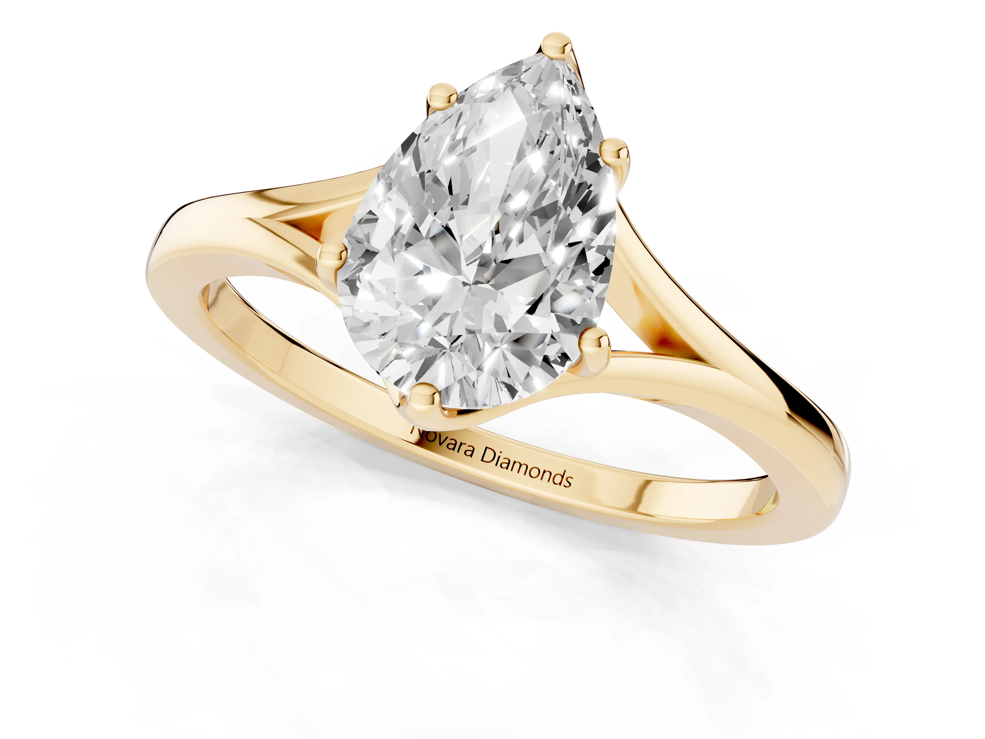 Pear Cut Diamond Solitaire Ring Set in Yellow gold with Polished Tapered Band and Prong Setting