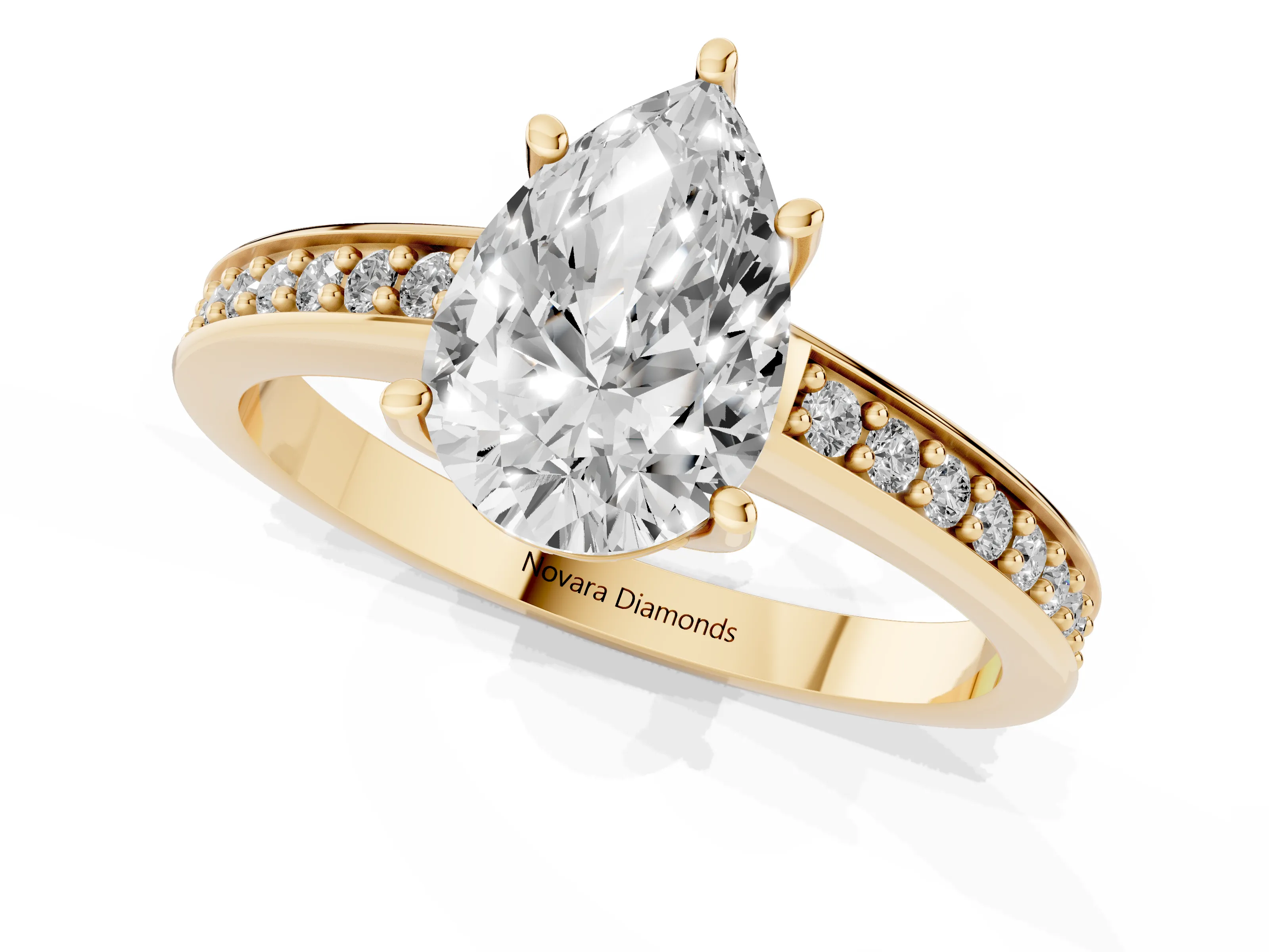 Pear Cut Diamond Pavé Band Prong Set Solitaire Ring Set in Yellow gold