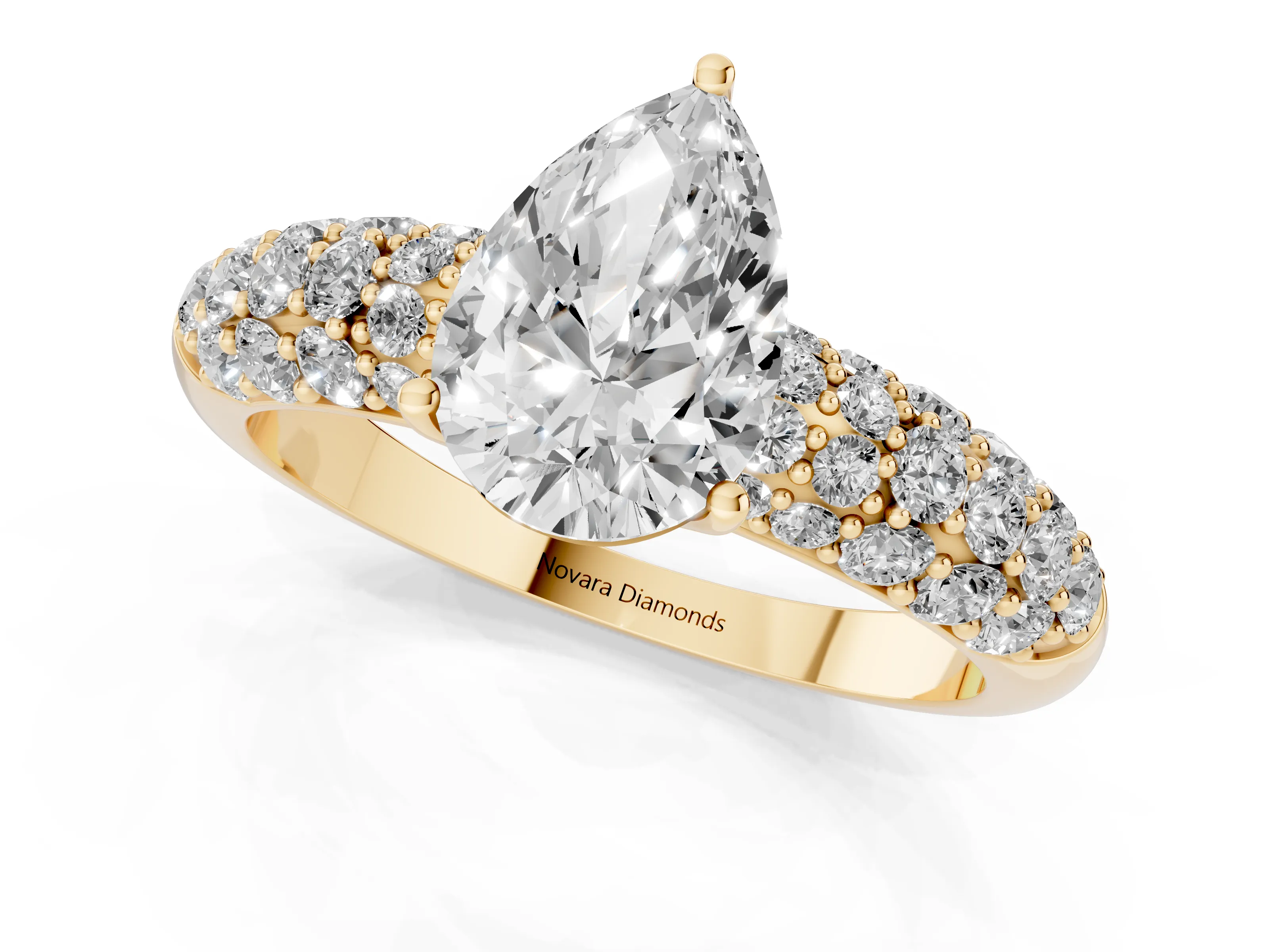 Pear Cut Diamond Pavé Band Solitaire Ring Set in Yellow gold with Close-Set Accent Stones and Prong Setting