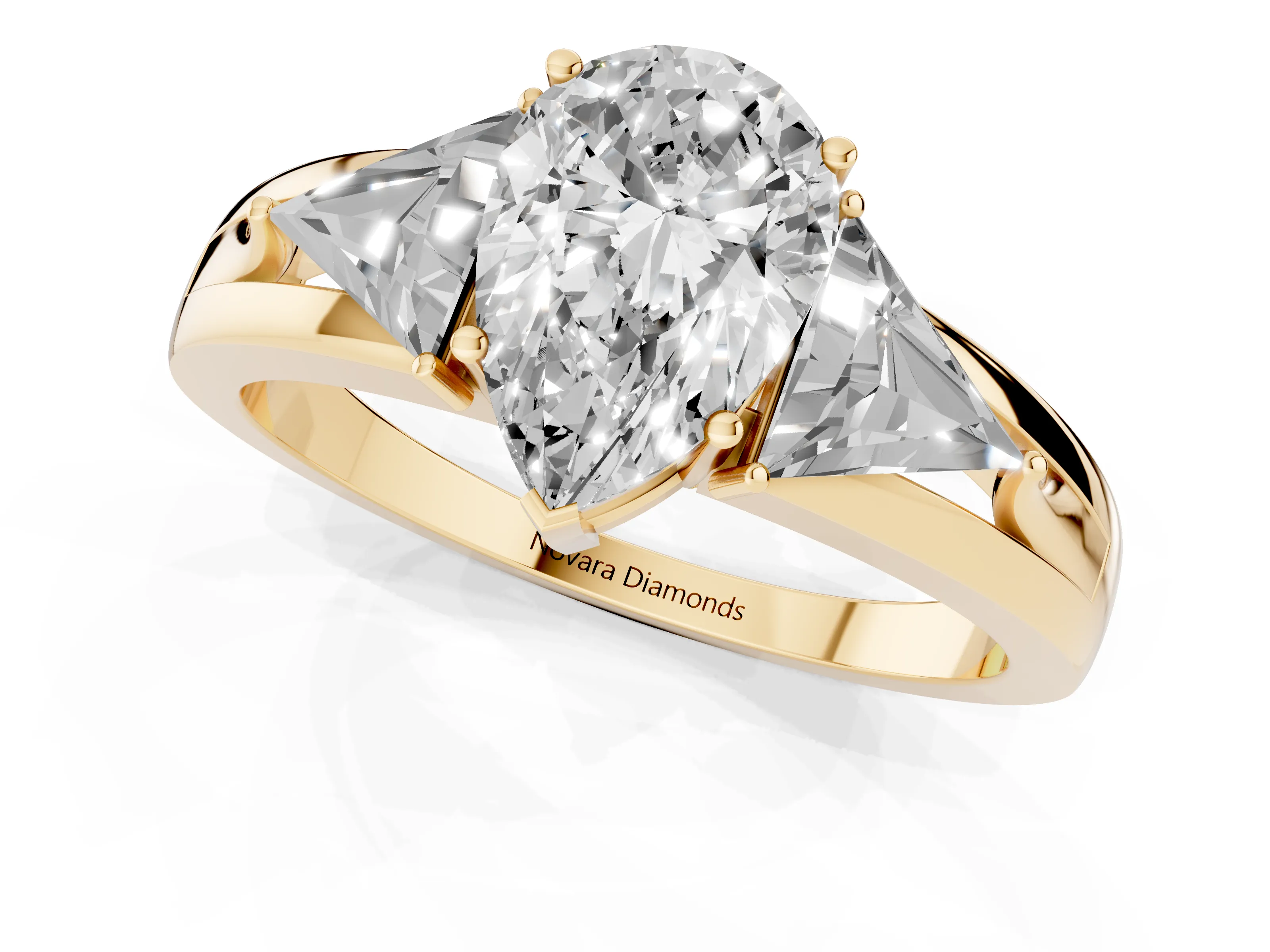 Pear Cut Diamond Three-Stone Ring Set in Yellow gold with Trillion Side Stones and Split Shank