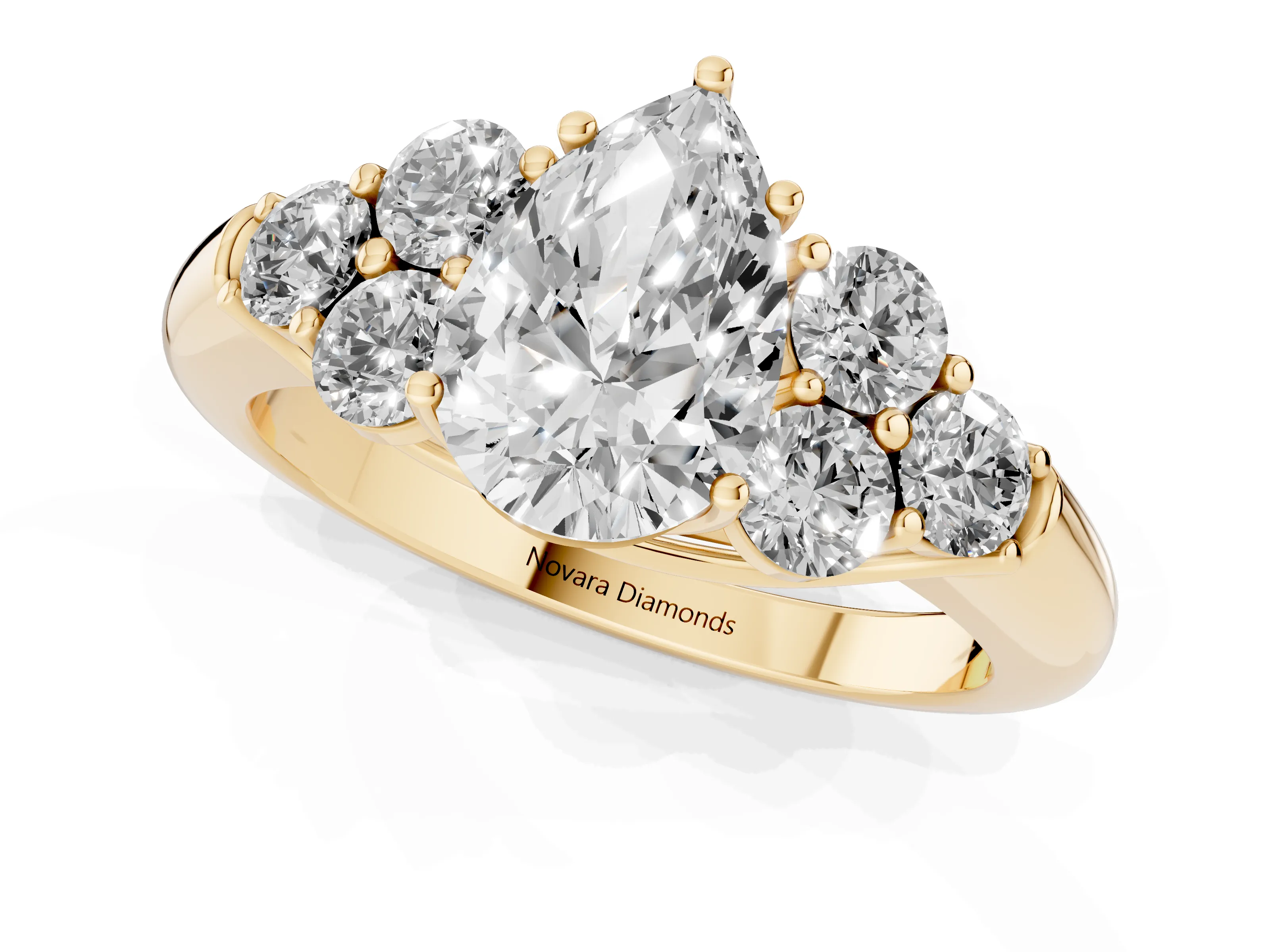 Pear Cut Diamond Cluster Ring Set in Yellow gold with Round Accent Stones and Prong Setting on a Plain Band