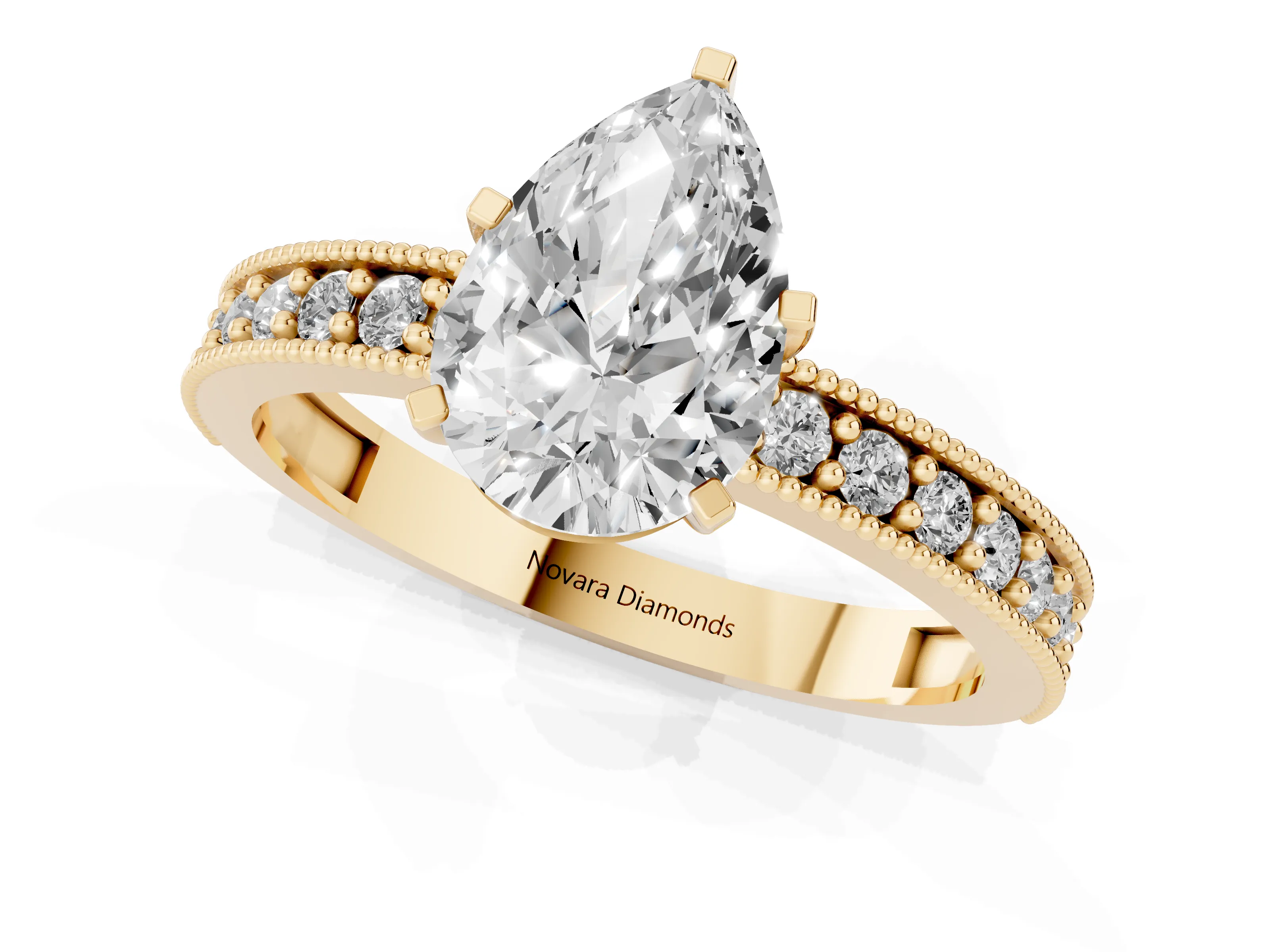 Pear Cut Diamond Milgrain Pavé Engagement Ring Set in Yellow gold with Prong Setting