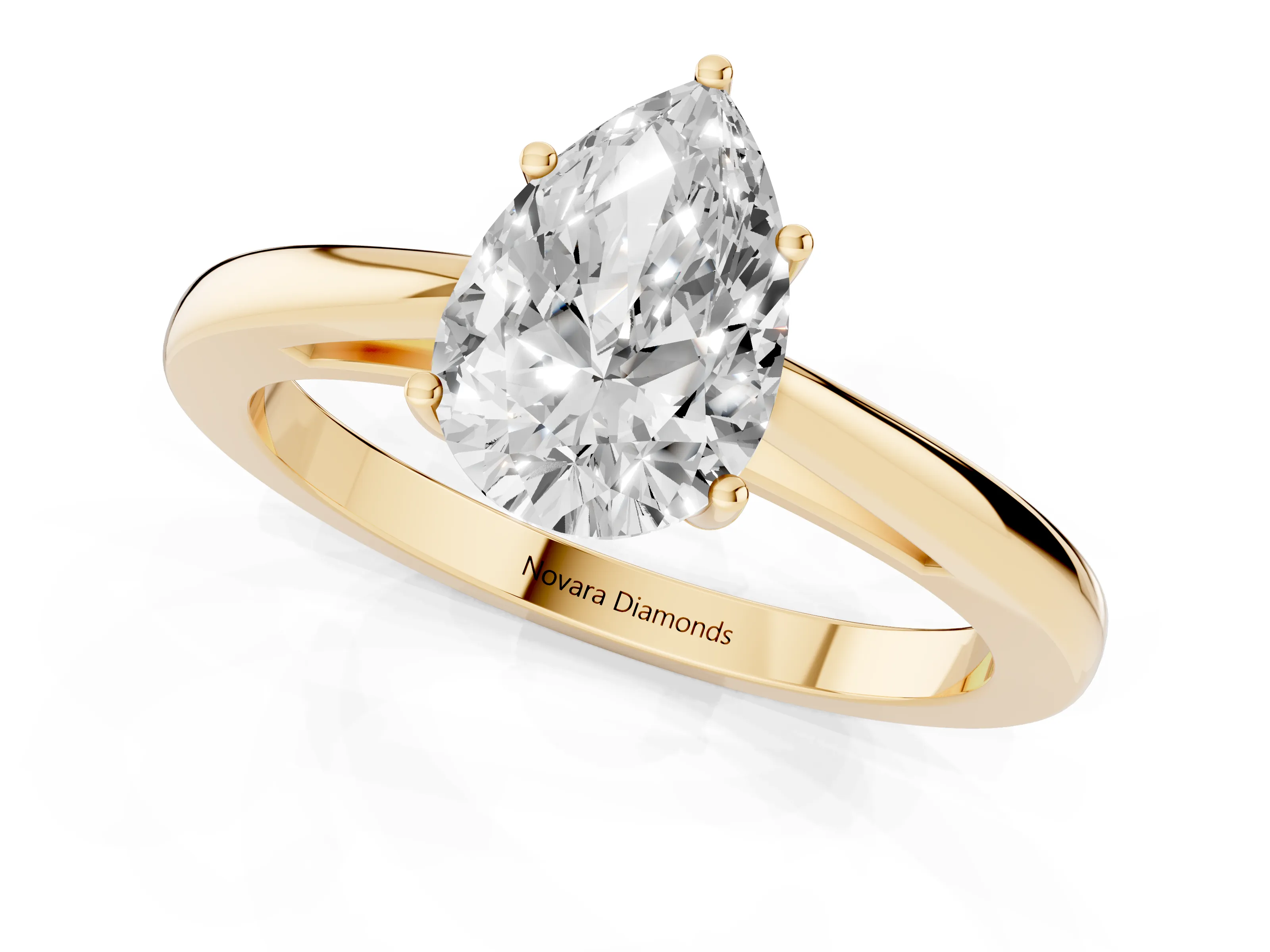 Pear Cut Diamond Solitaire Ring Set in Yellow gold with Split Shank and Prong Setting