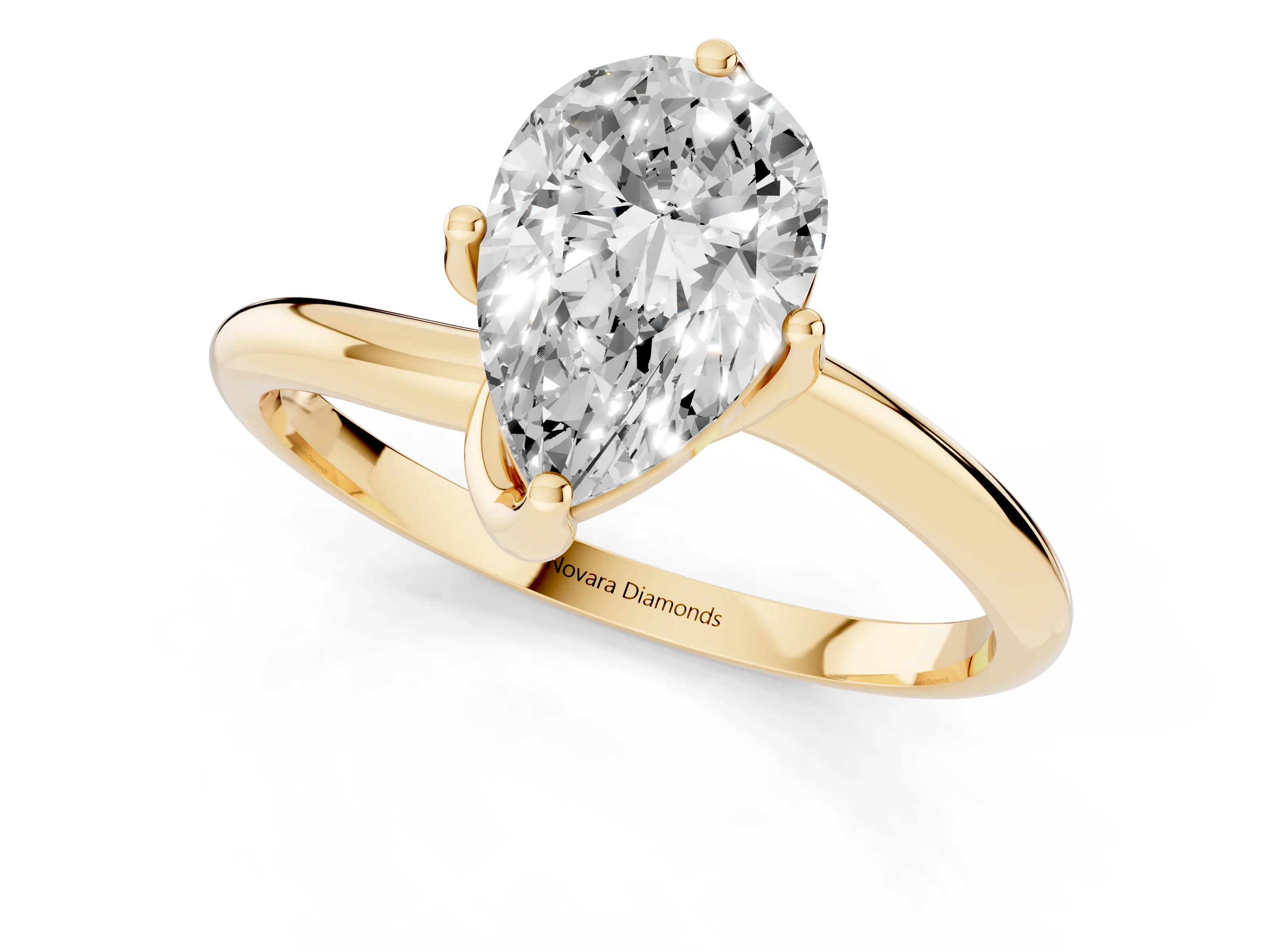 Pear Cut Diamond Solitaire Engagement Ring Set in Yellow gold with Classic Plain Band